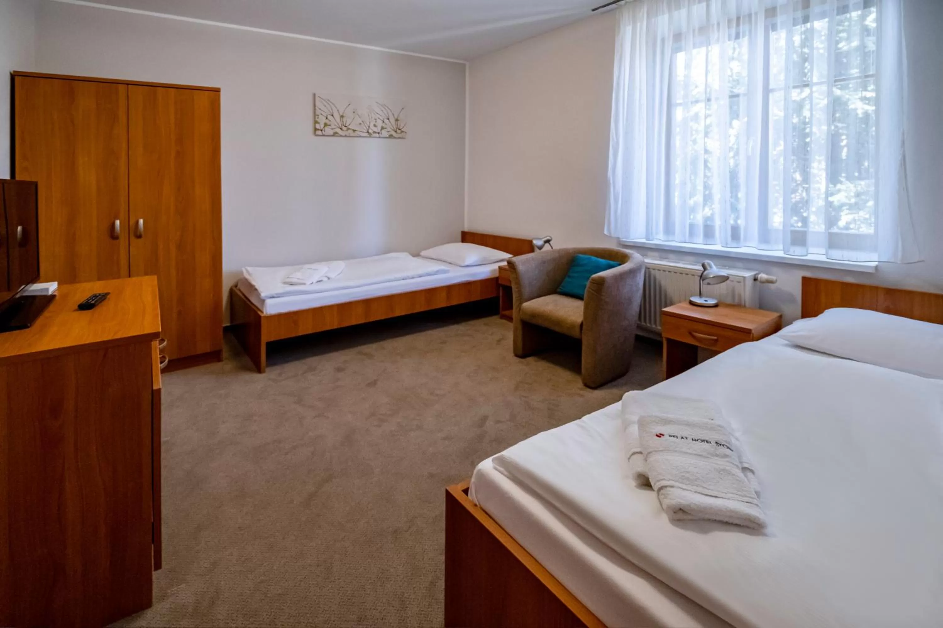 Bed in Relax Hotel Stork