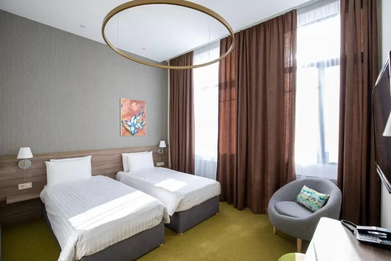 Twin Room with City View in Four Rooms City Twin Room with City View in Four Rooms City