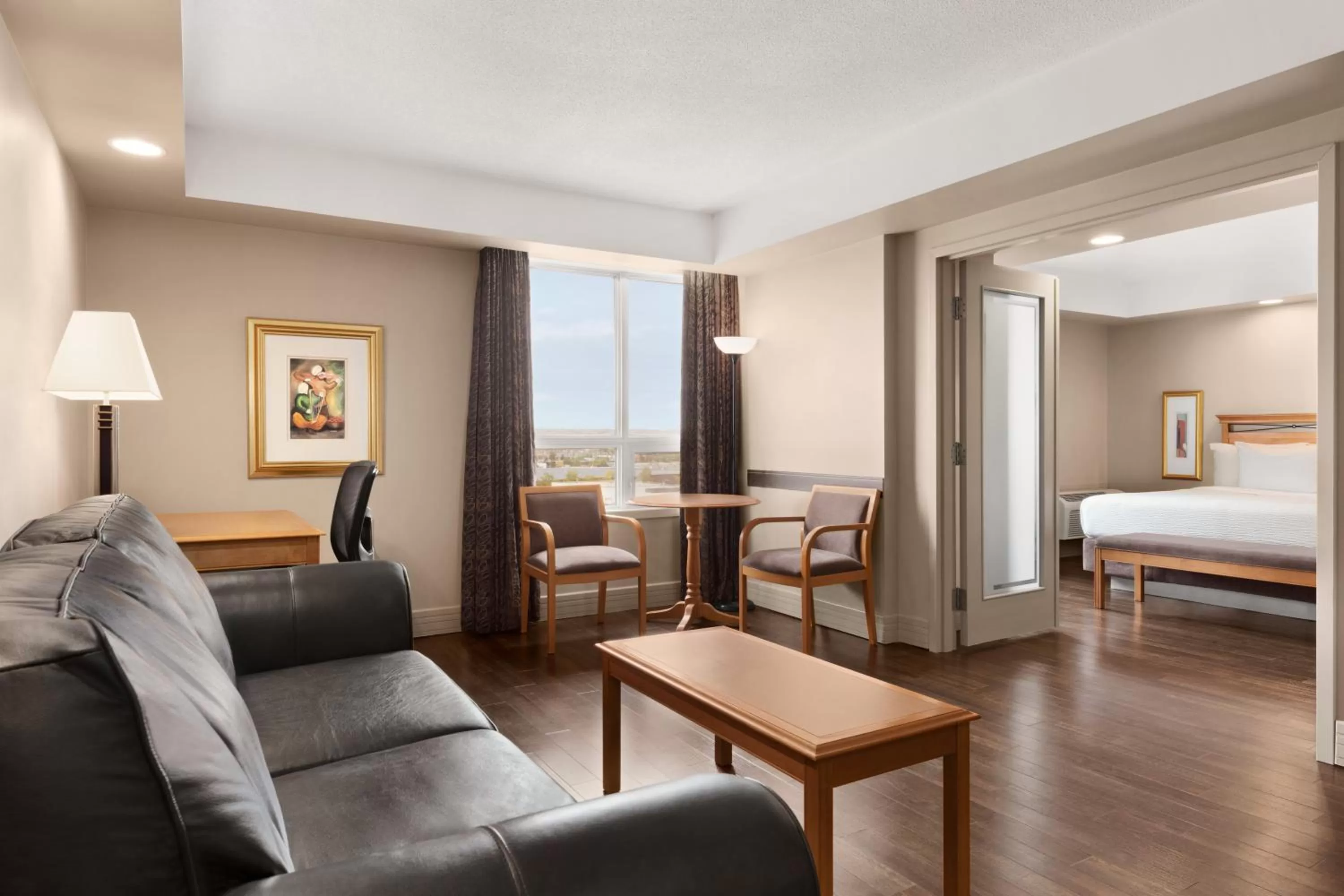 Living room, Bed in Royal Hotel Calgary, Trademark Collection by Wyndham