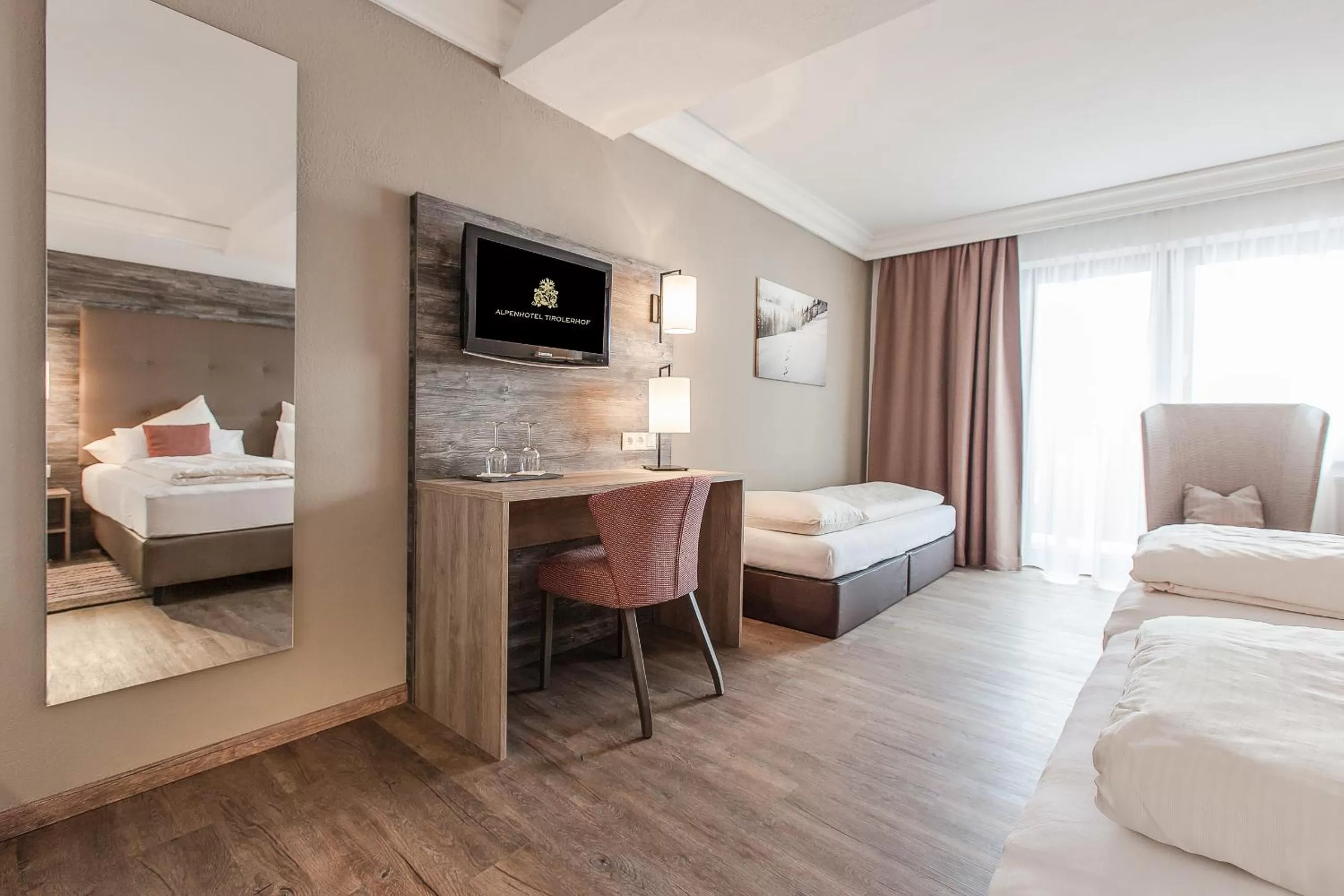 Photo of the whole room, Bed in Alpenhotel Tirolerhof