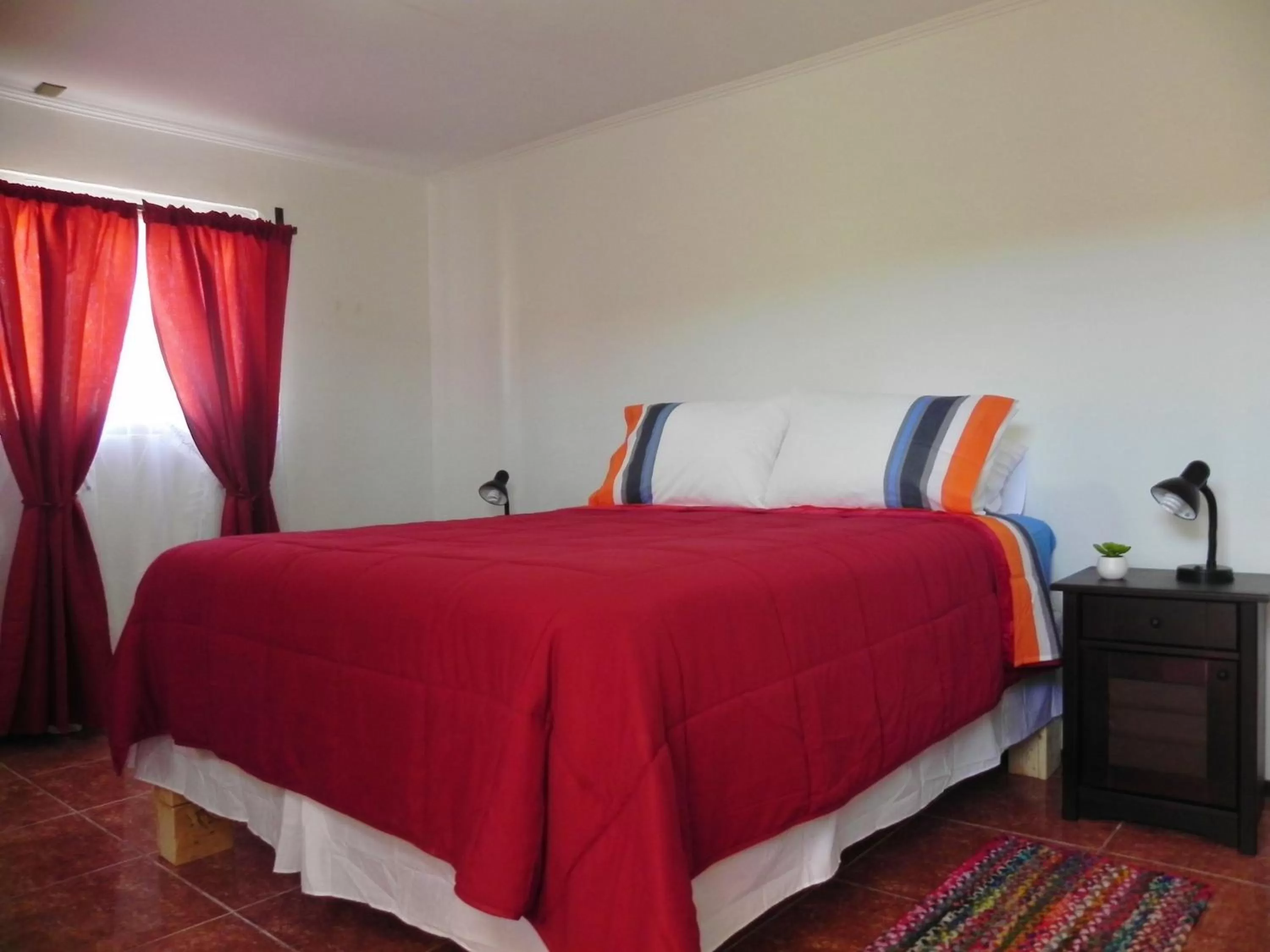 Photo of the whole room, Bed in Hostal Siete Colores