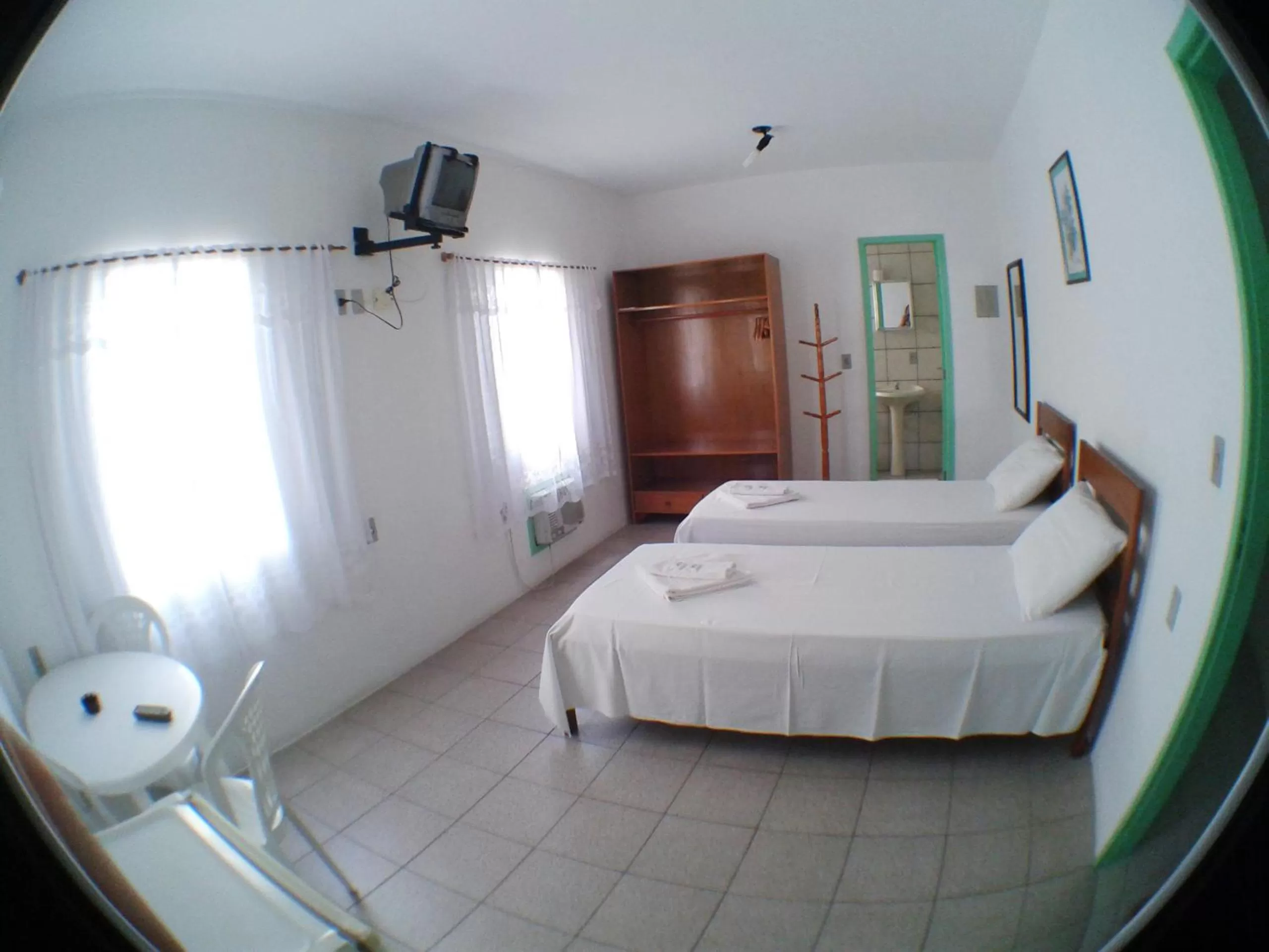 Bed in Pousada Milani