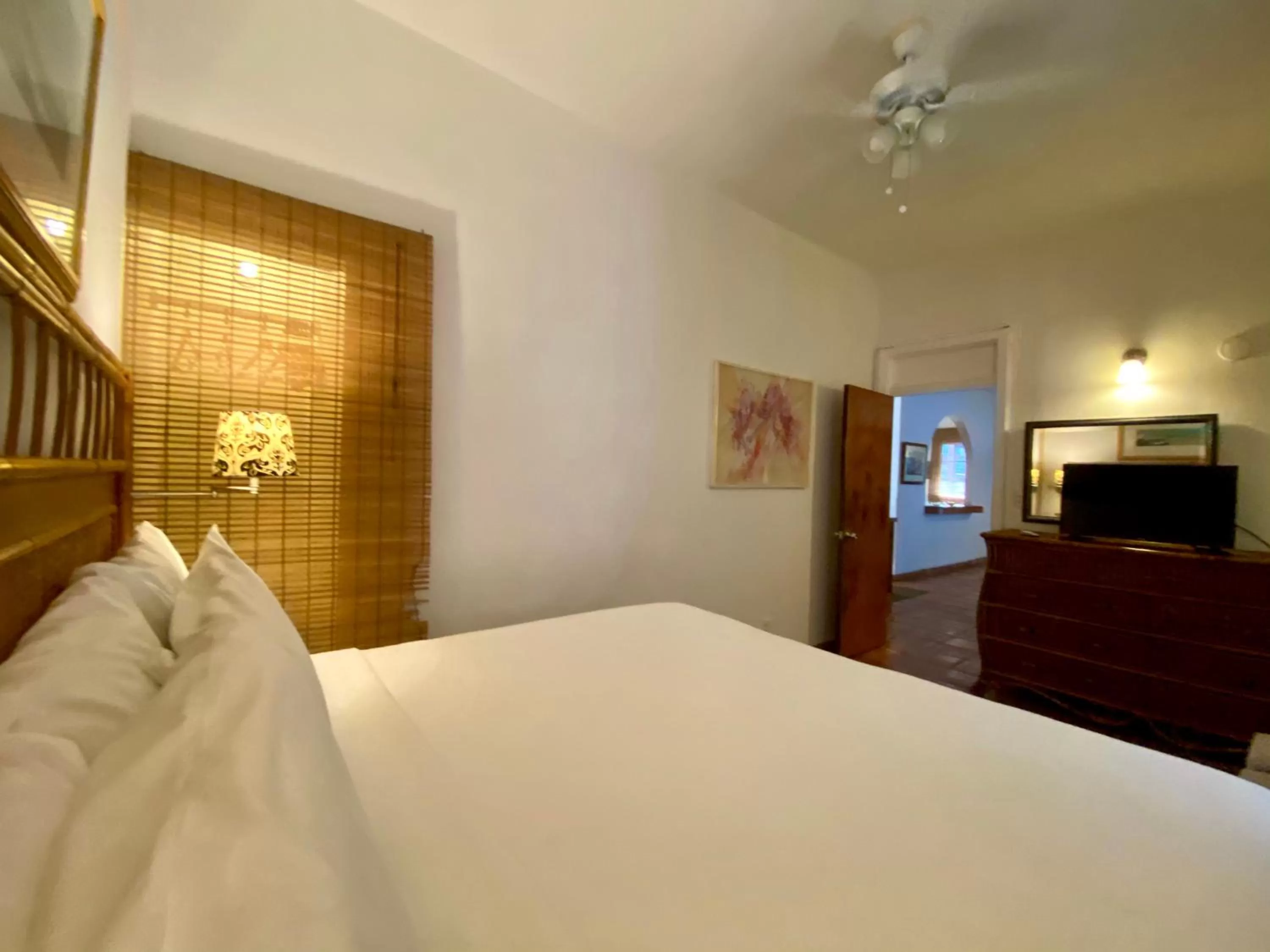 Bed in At Wind Chimes Boutique Hotel