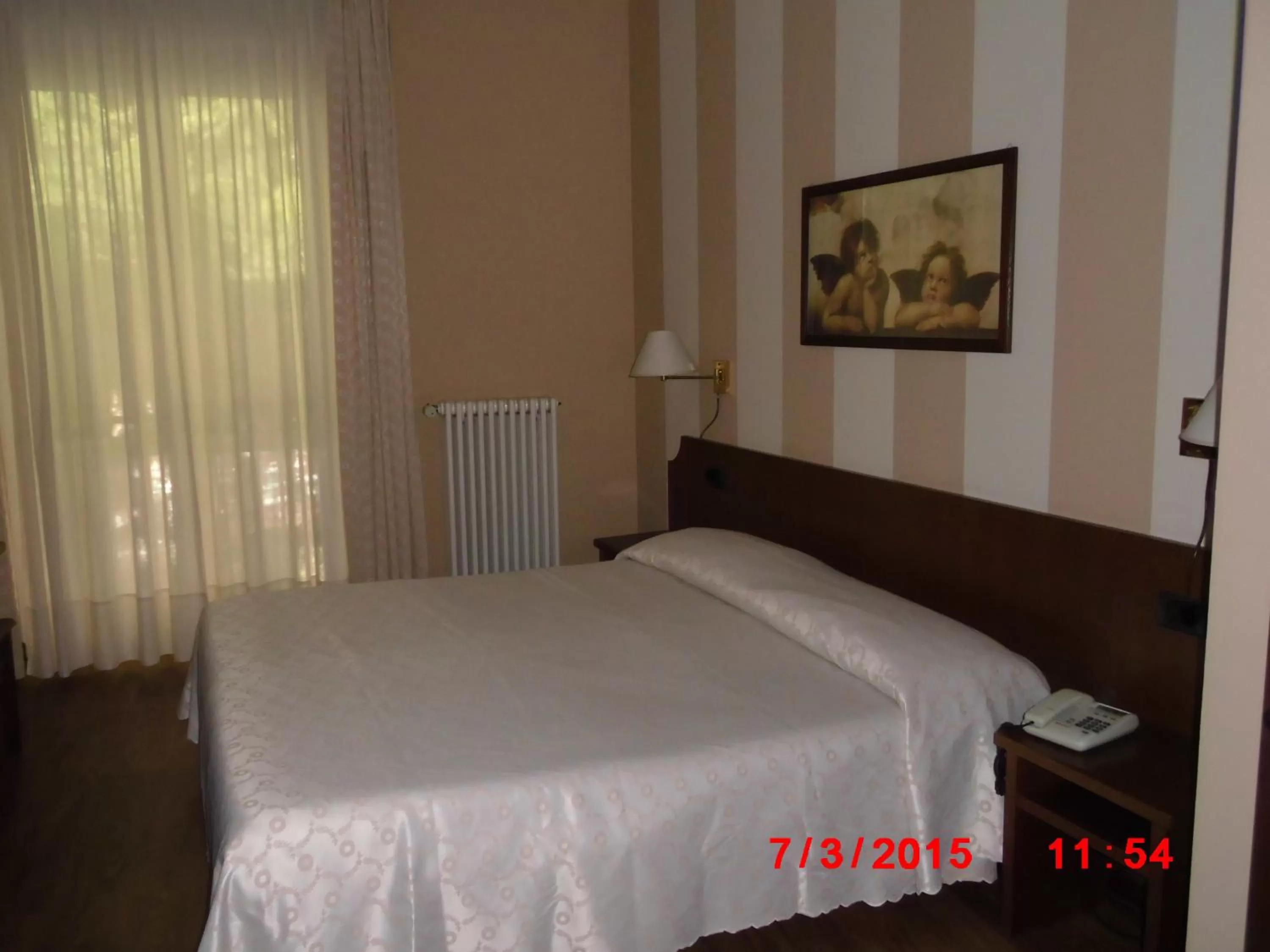 Bed in Albergo Ponte Vecchio