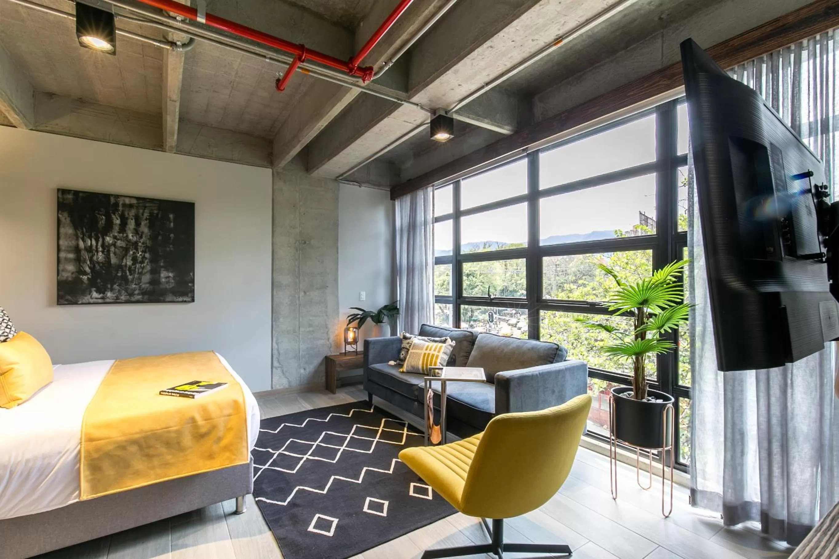 Bed in Factory Lofts Hotel