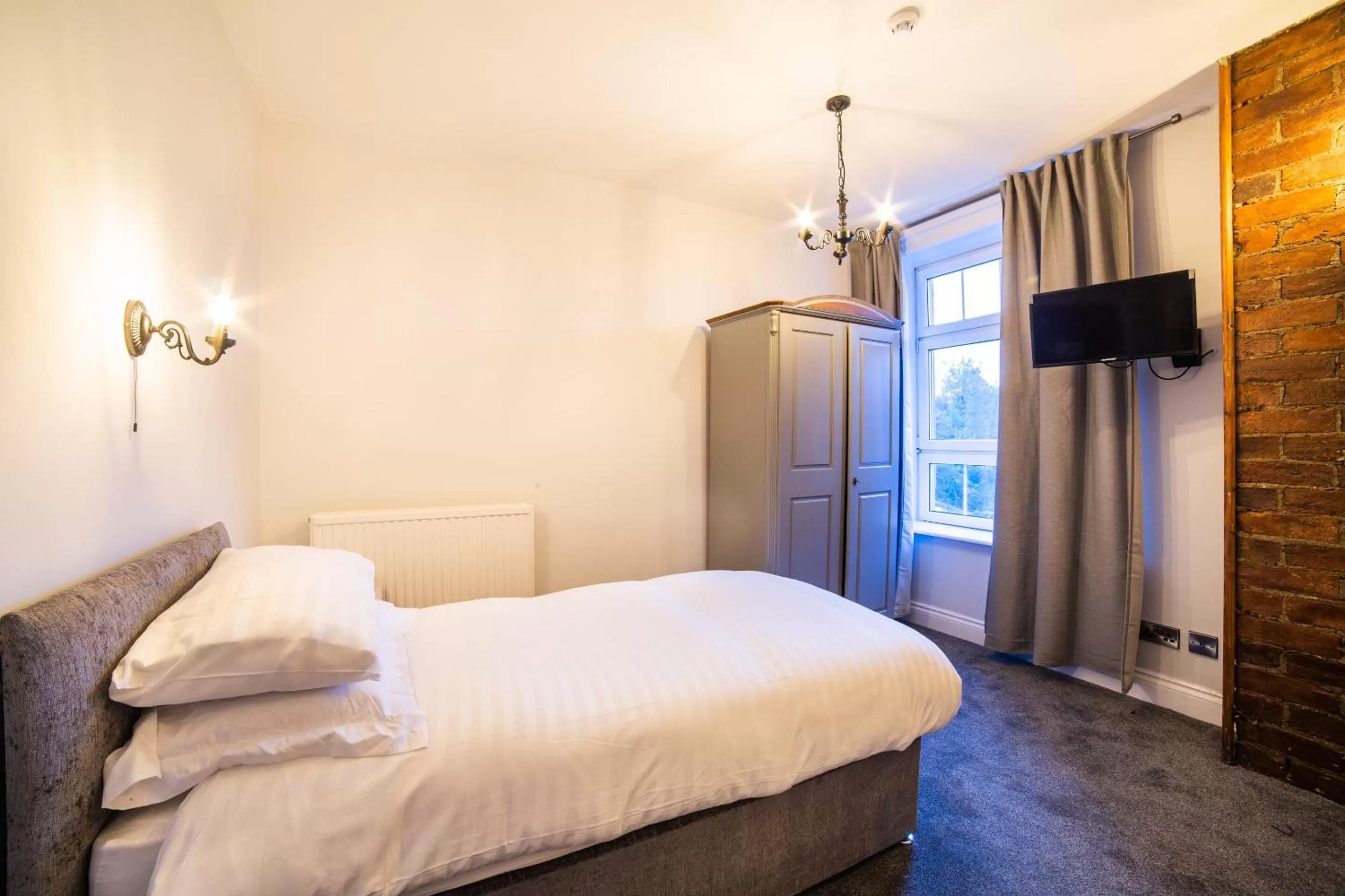 Bed in Churchill's Hotel