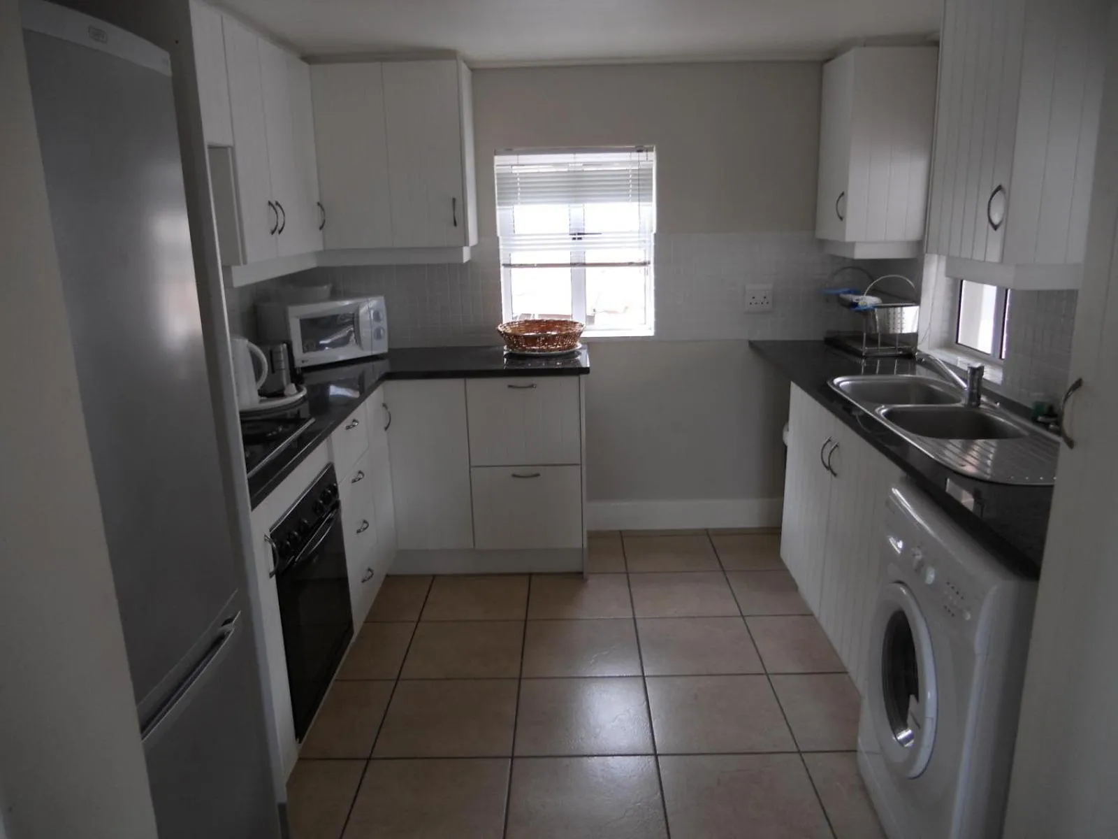 Kitchen or kitchenette in Blue Bay Lodge