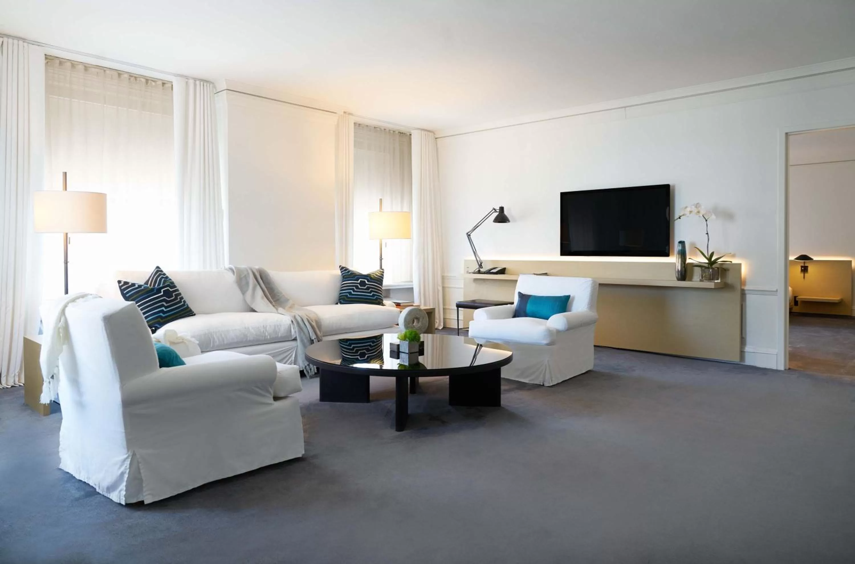 Living room in Ambassador Chicago, part of JdV by Hyatt