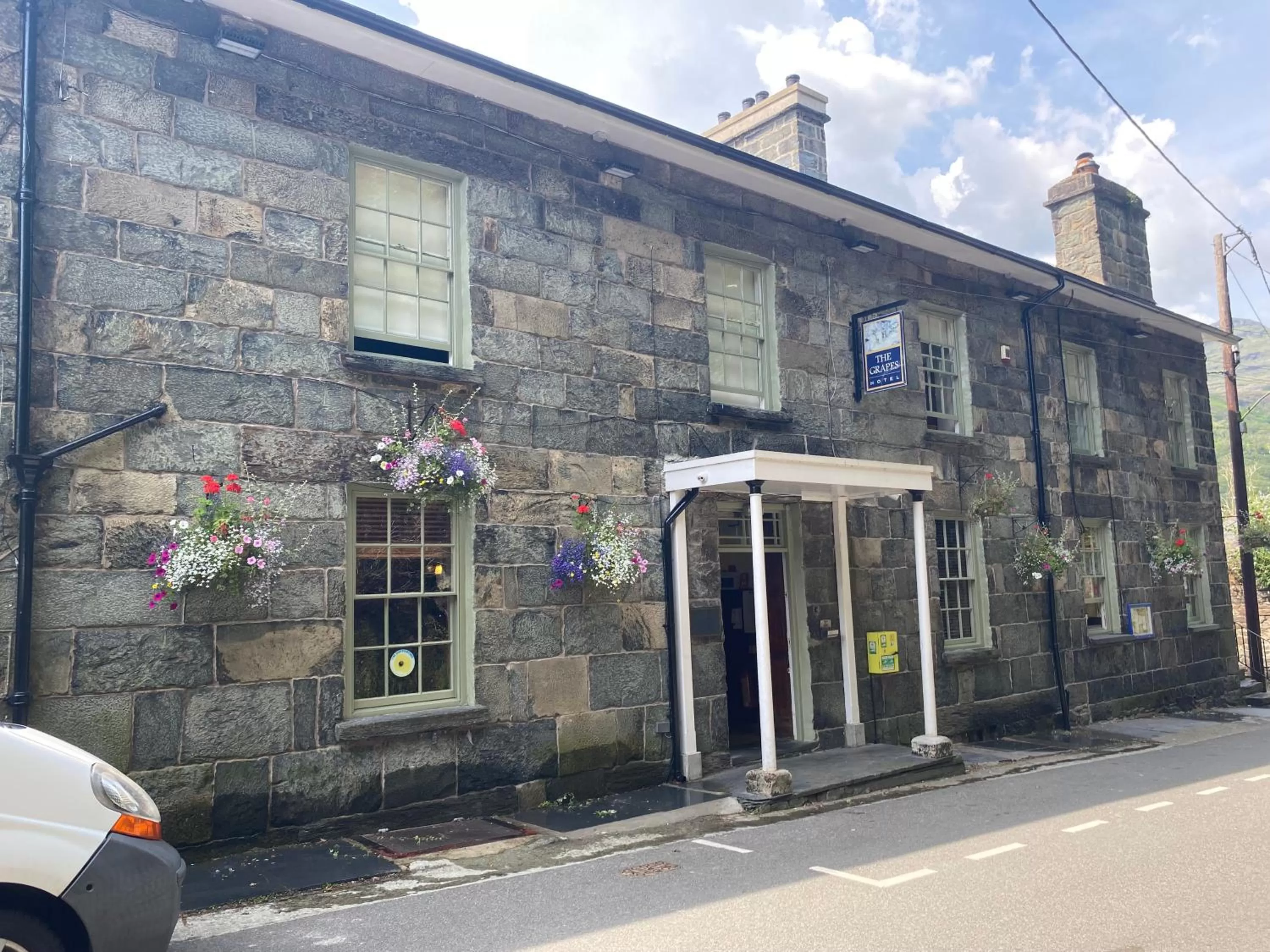 Property building in Grapes Hotel, Bar & Restaurant Snowdonia Nr Zip World