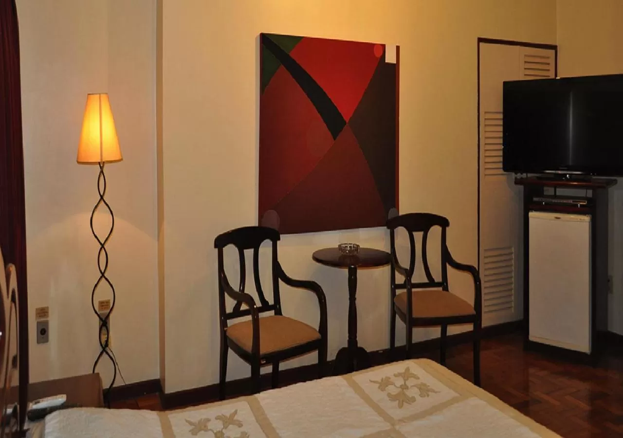 Bedroom, Seating Area in Hotel Cataguases