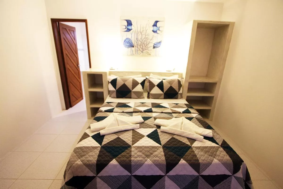 Bed in Pousada Recanto da Praia