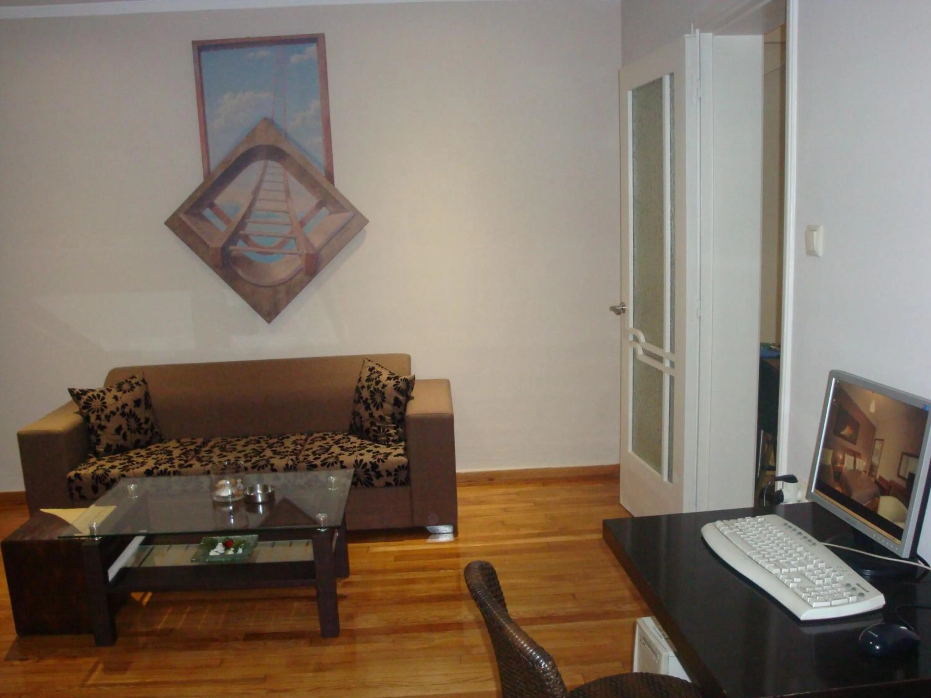 Communal lounge/ TV room in Ambrosia Suites