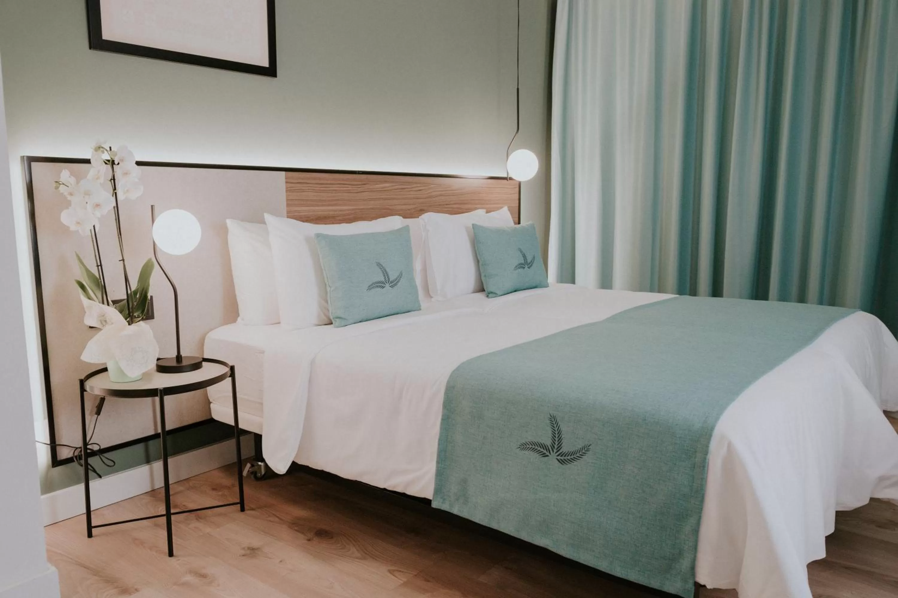 Bed in Catalina Plaza Hotel Sostenible