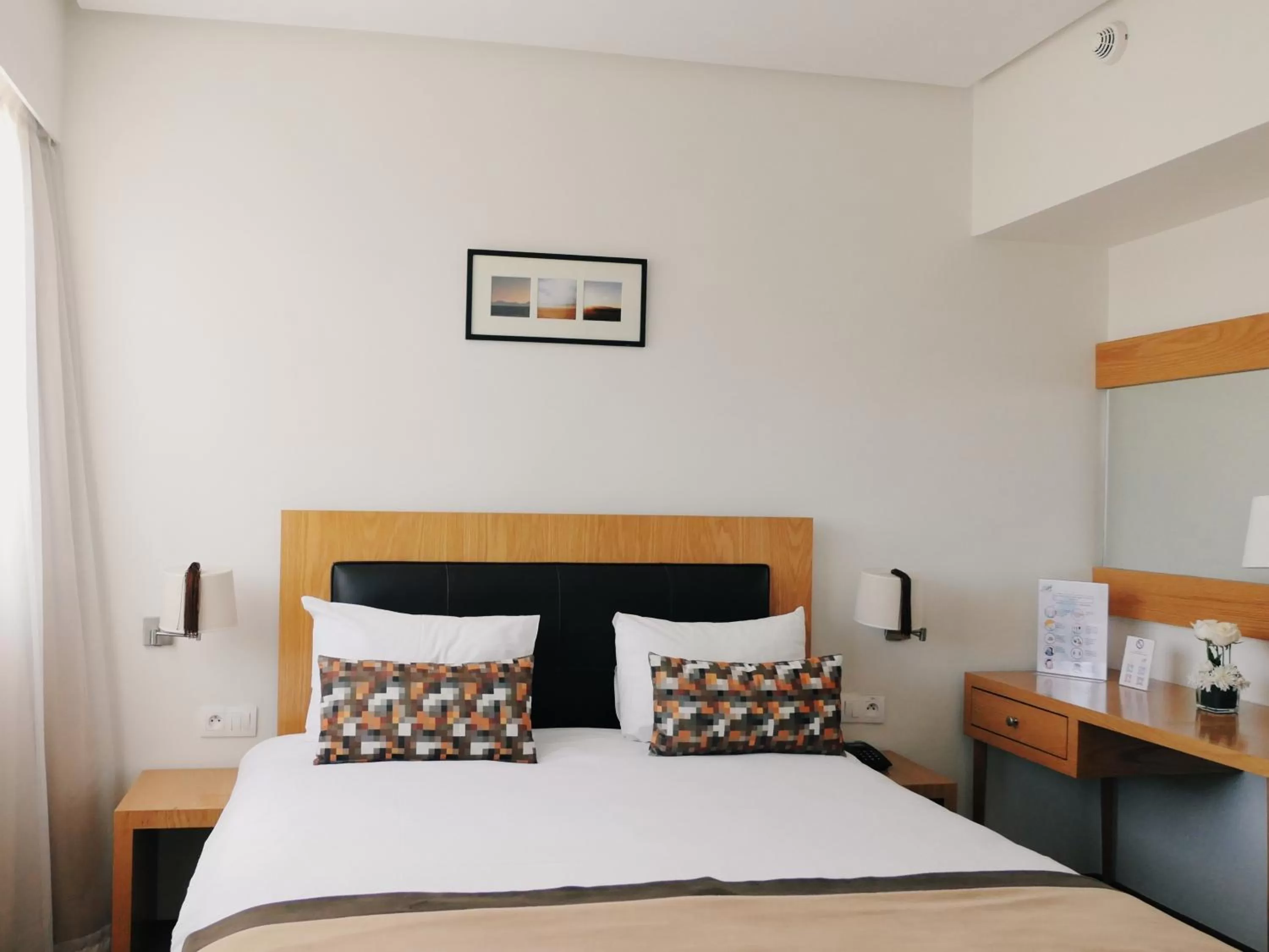 Bed in Le Pietri Urban Hotel