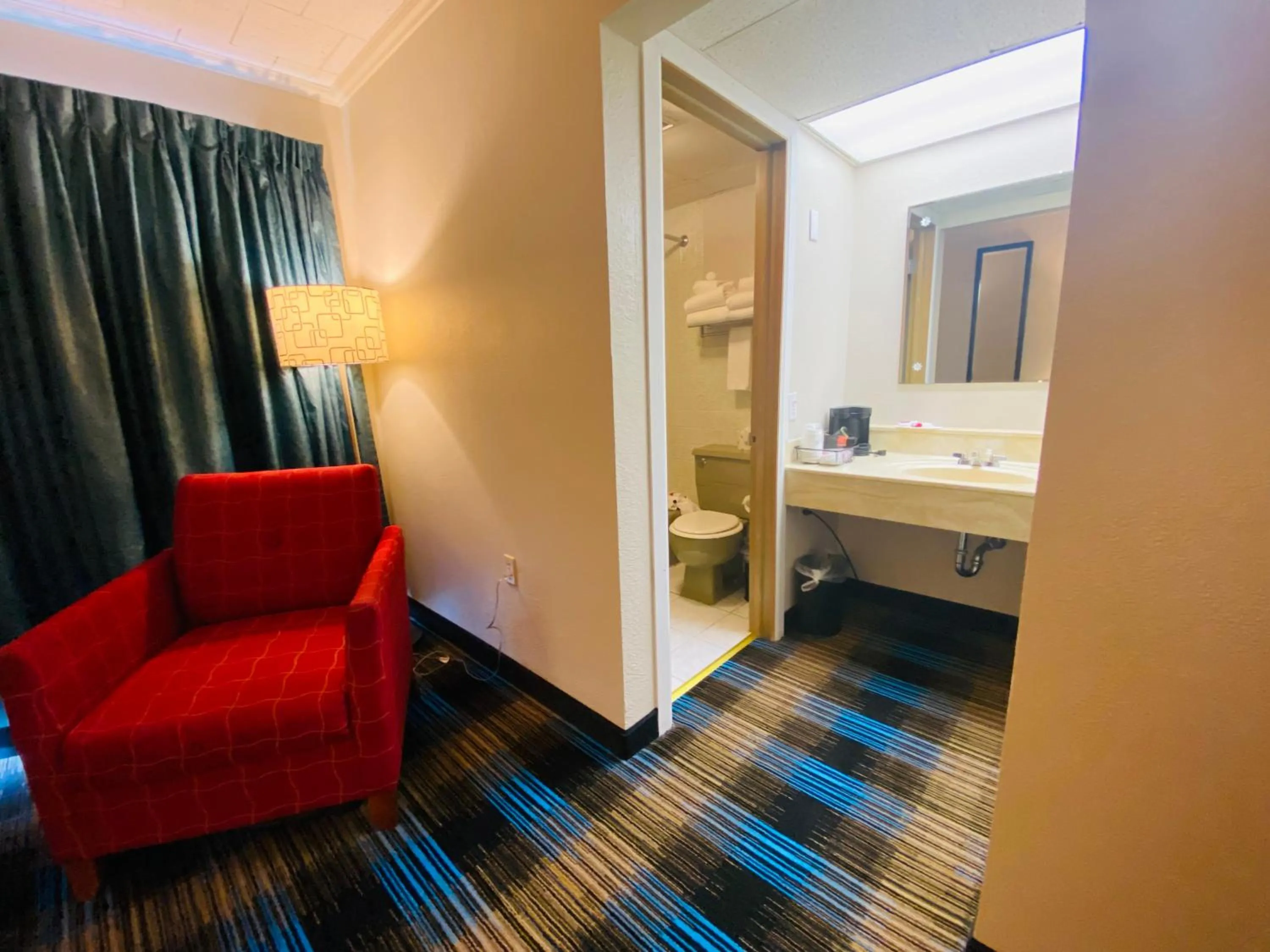 Bathroom in Days Inn & Suites by Wyndham St. Ignace Lakefront