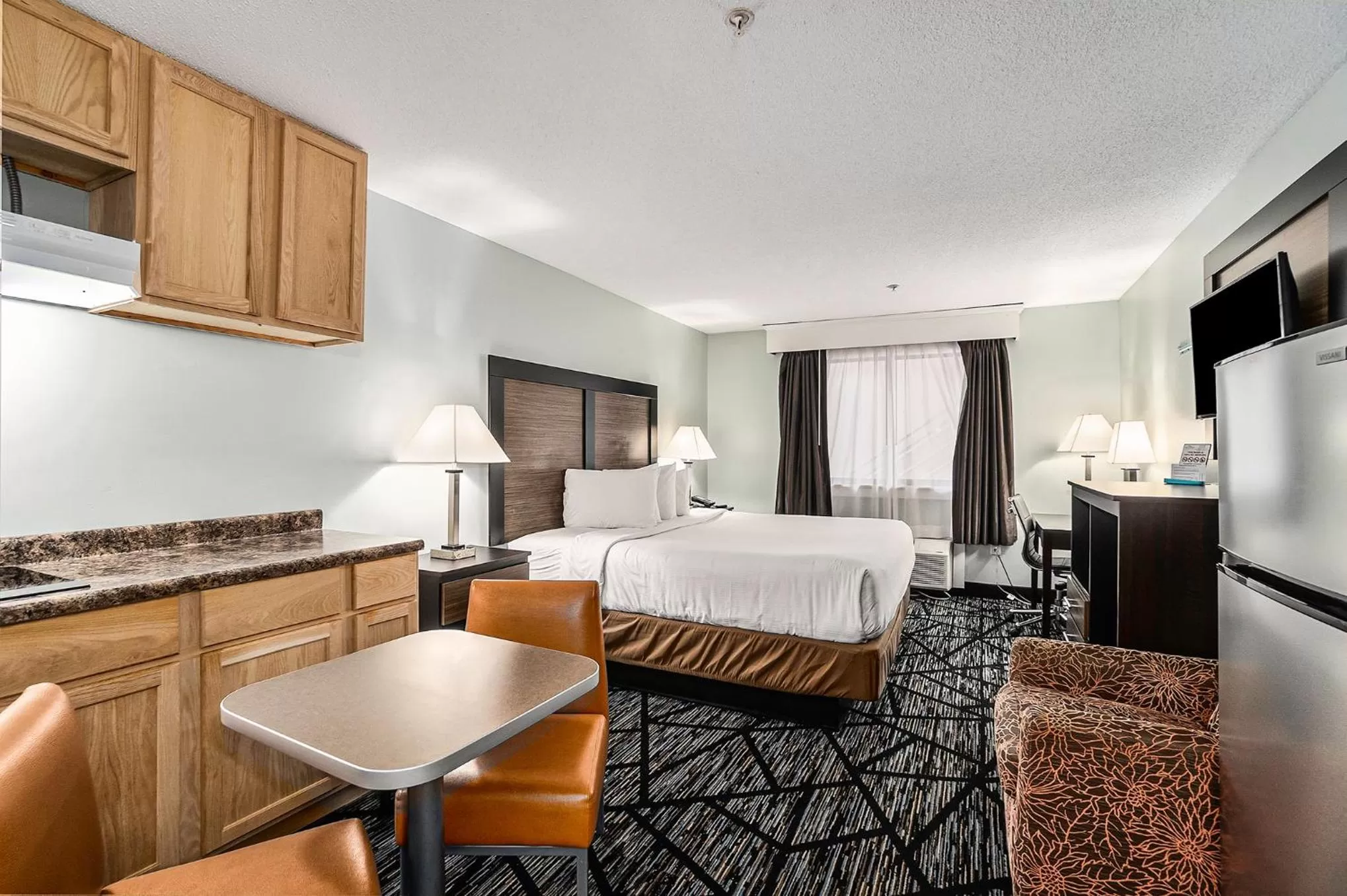 Bed in Baymont by Wyndham Grand Haven