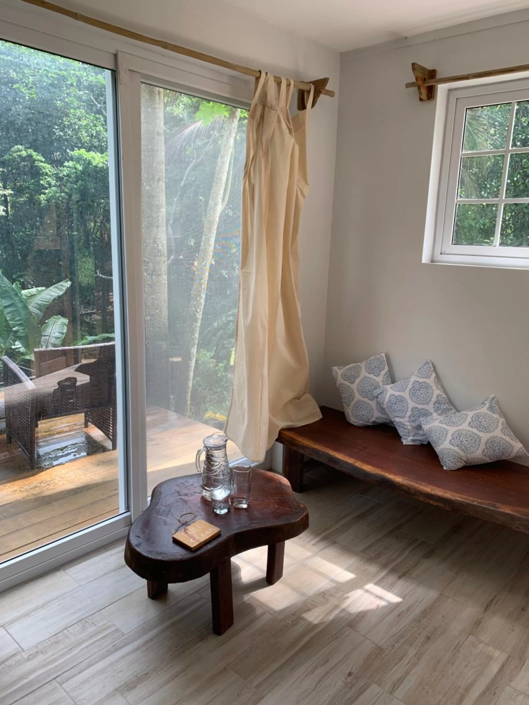 Photo of the whole room, Seating Area in Bird Island Bungalows