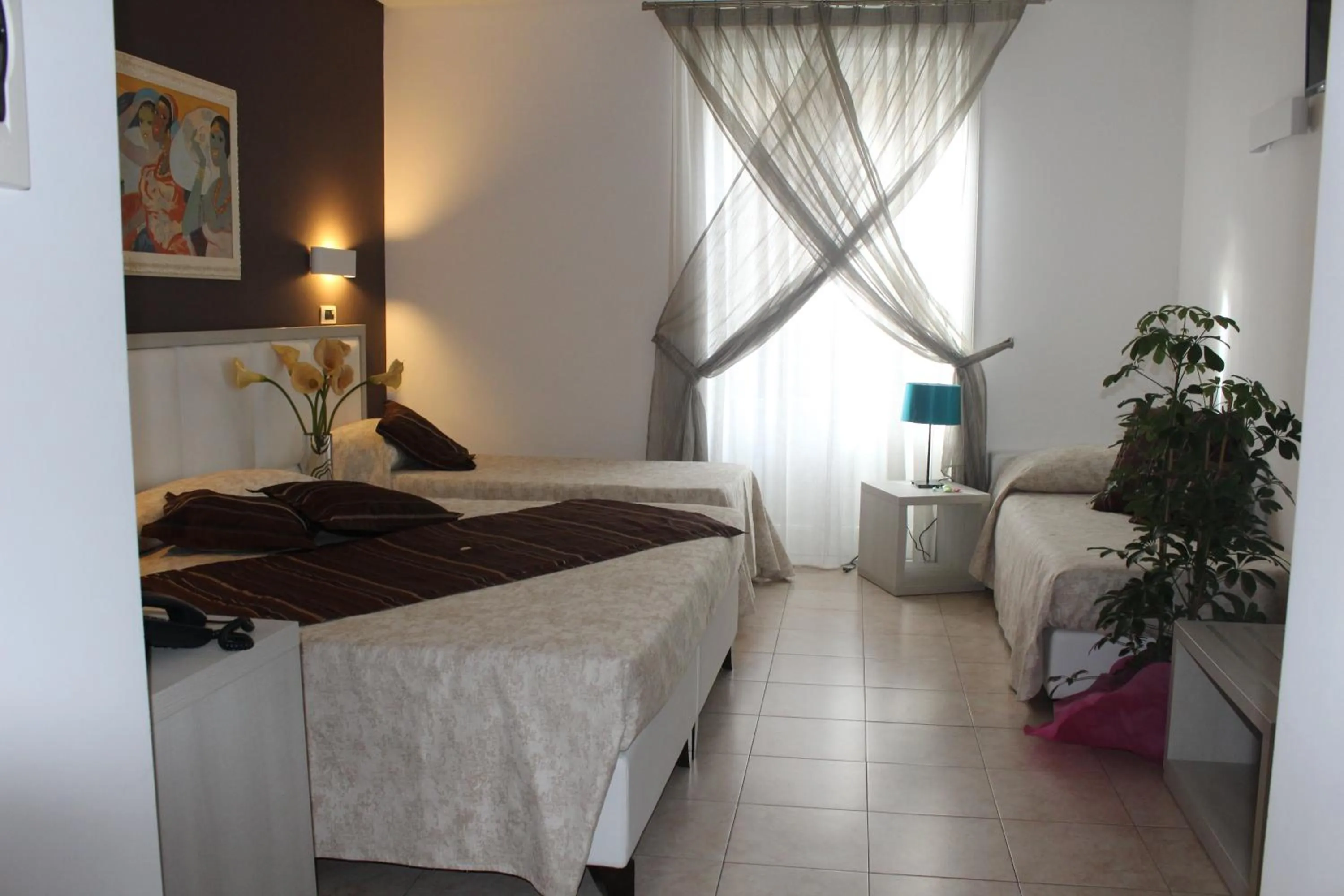 Bed in Artemisia Palace Hotel