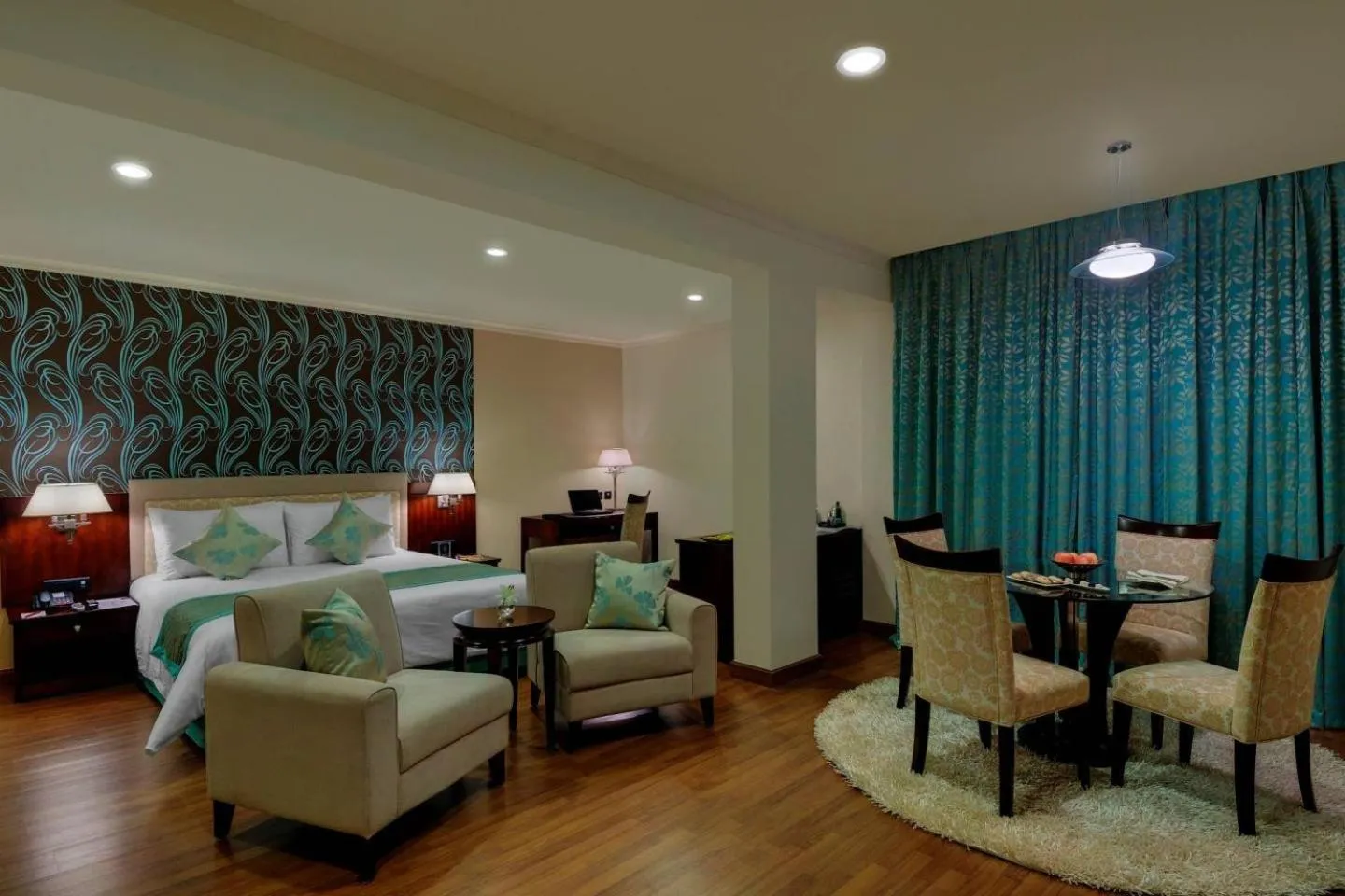 Photo of the whole room, Bed in Royalton Hyderabad Abids