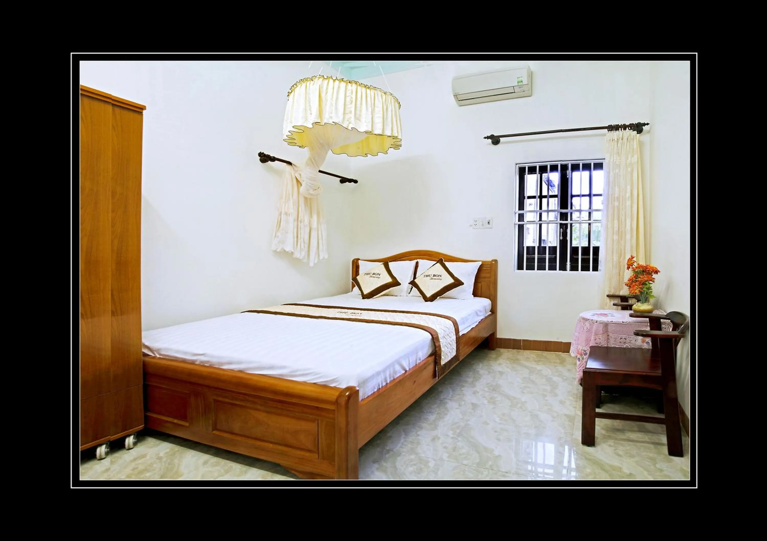 Photo of the whole room, Bed in Thu Bon Riverside Homestay