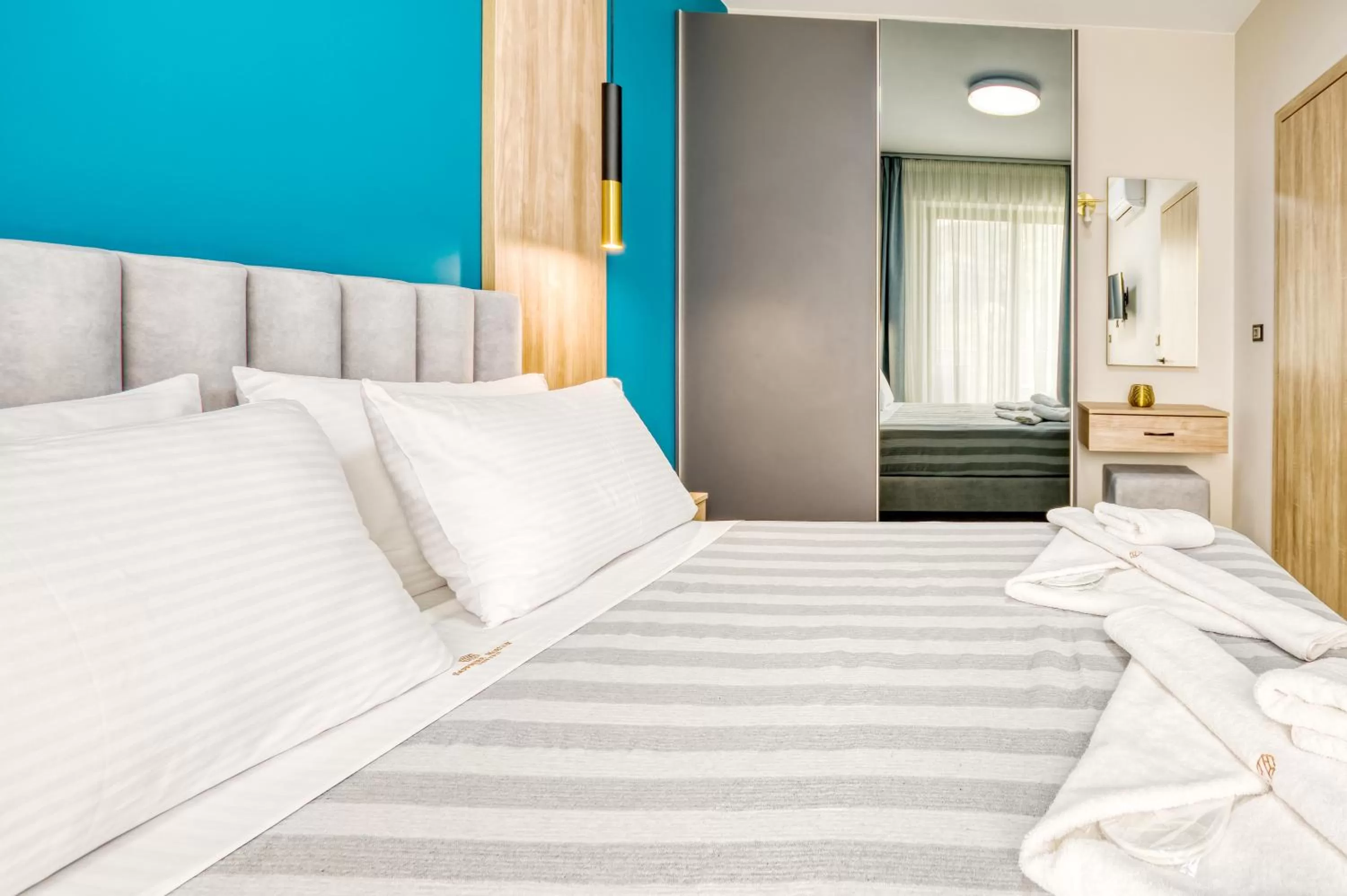 Bed in Sapphire Horizon Suites