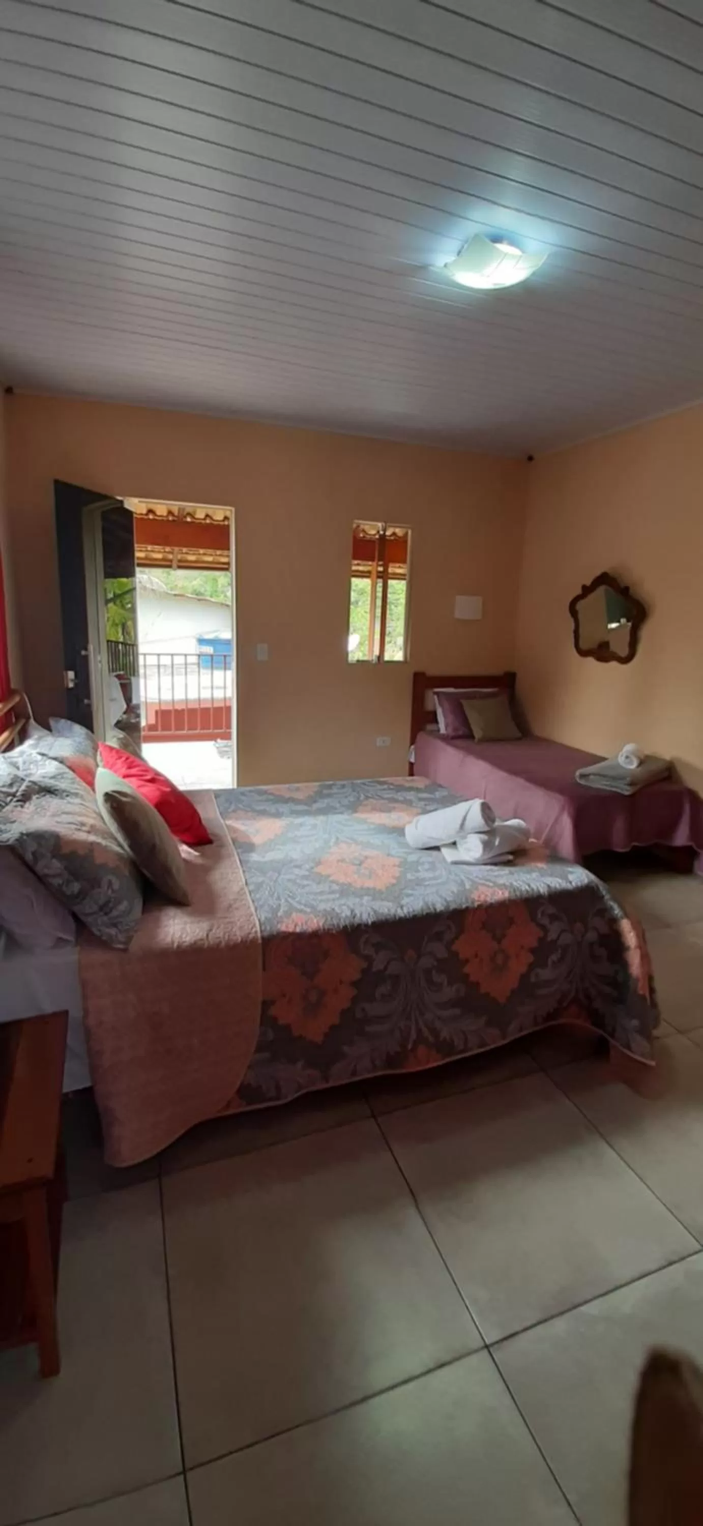 Bed in Pousada Recanto da Lu