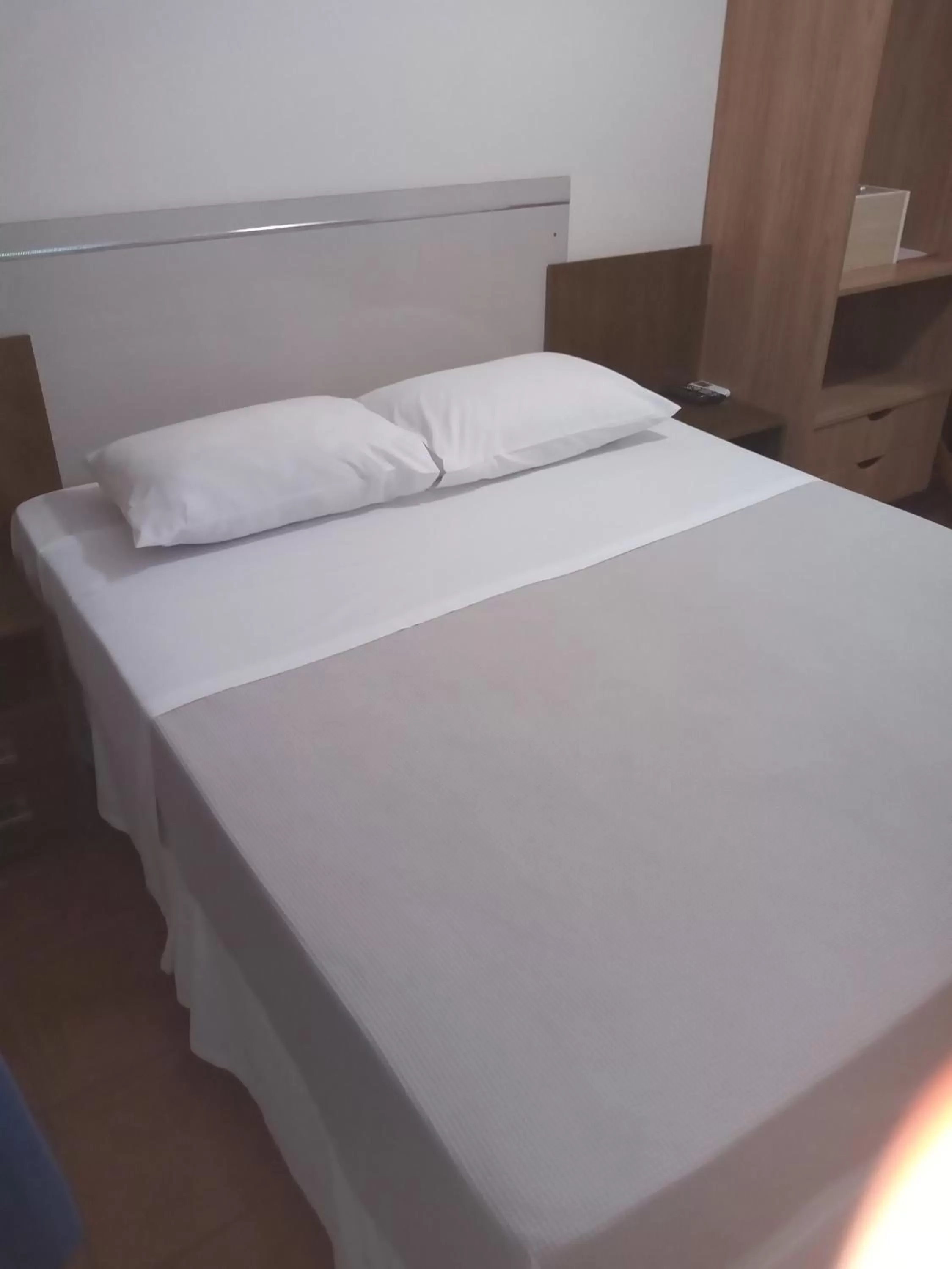 Bed in Pousada Japeju