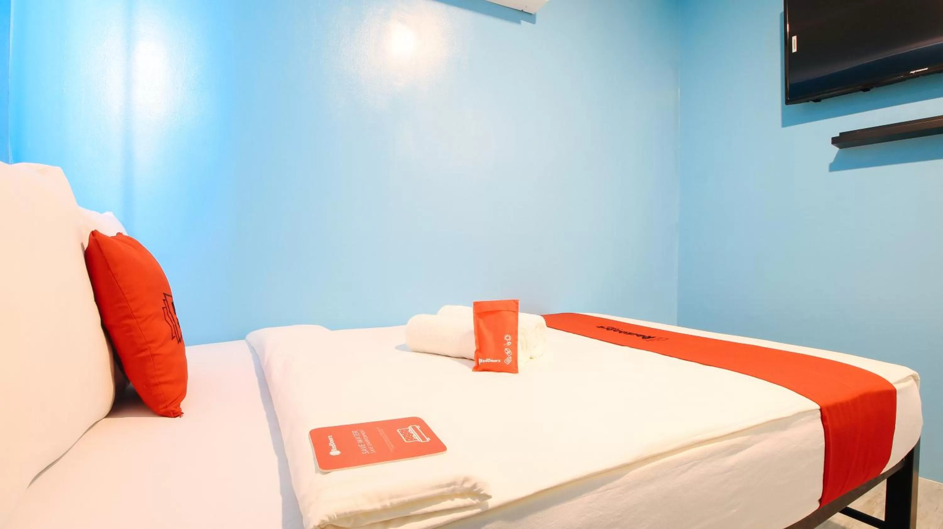 Photo of the whole room, Bed in RedDoorz at Hotel Rosemarie