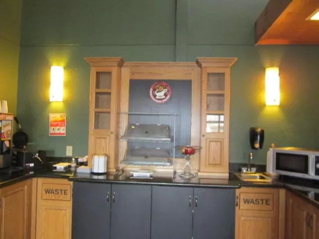 Kitchen or kitchenette in AmericInn by Wyndham West Bend