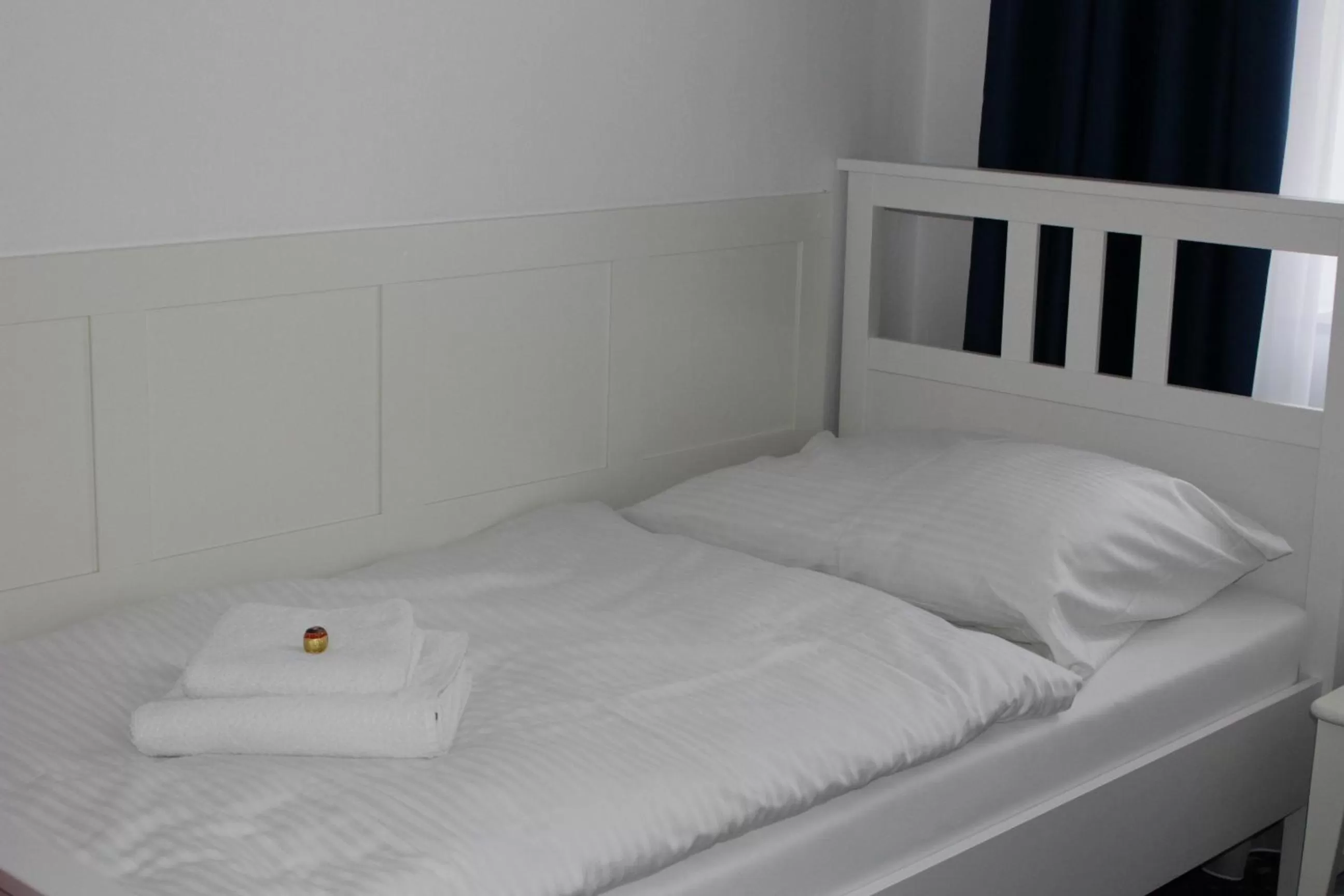 Bed in Hotel Amadeus