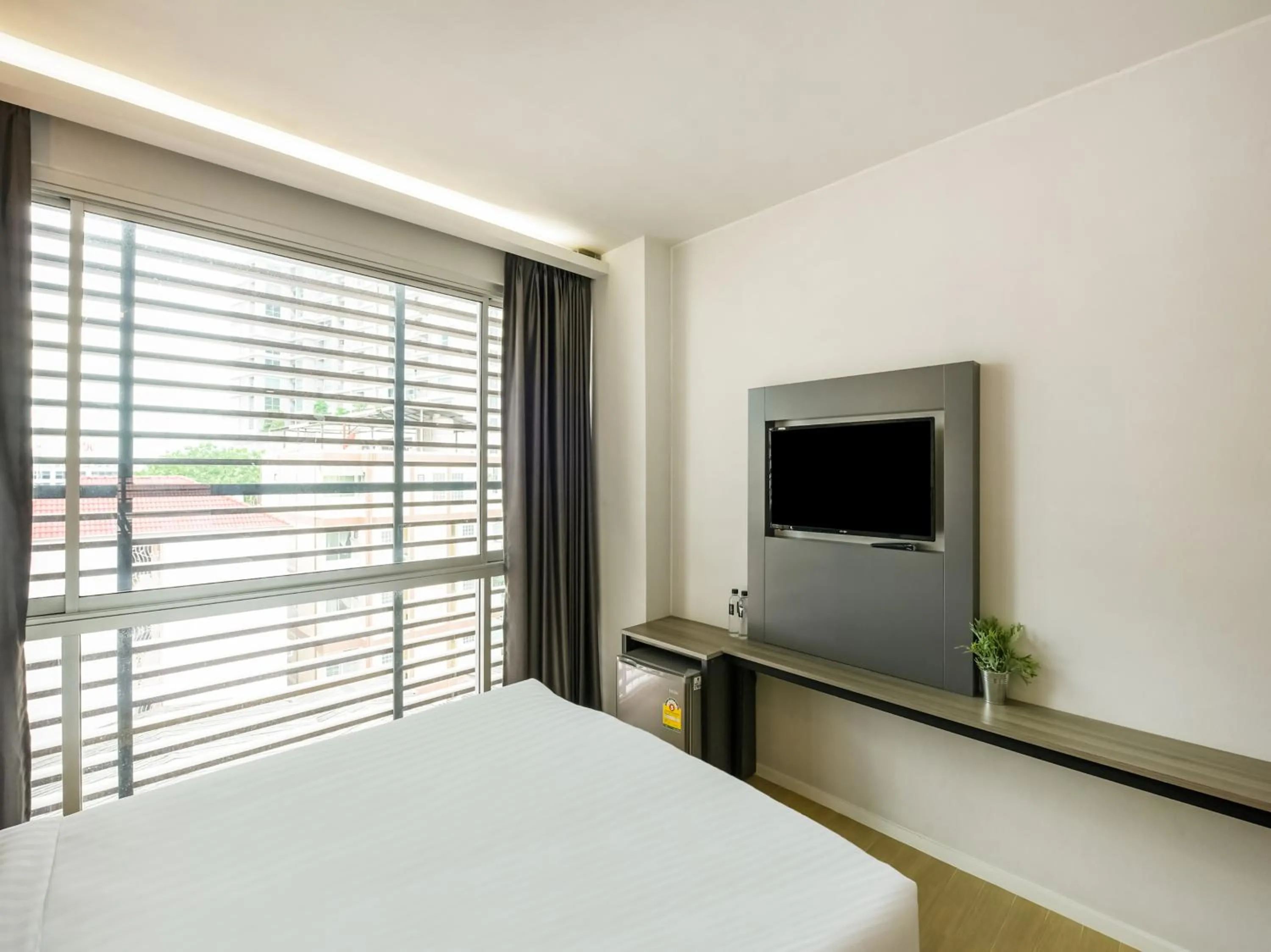 Bed in Kitzio House Hotel Huai Kwang