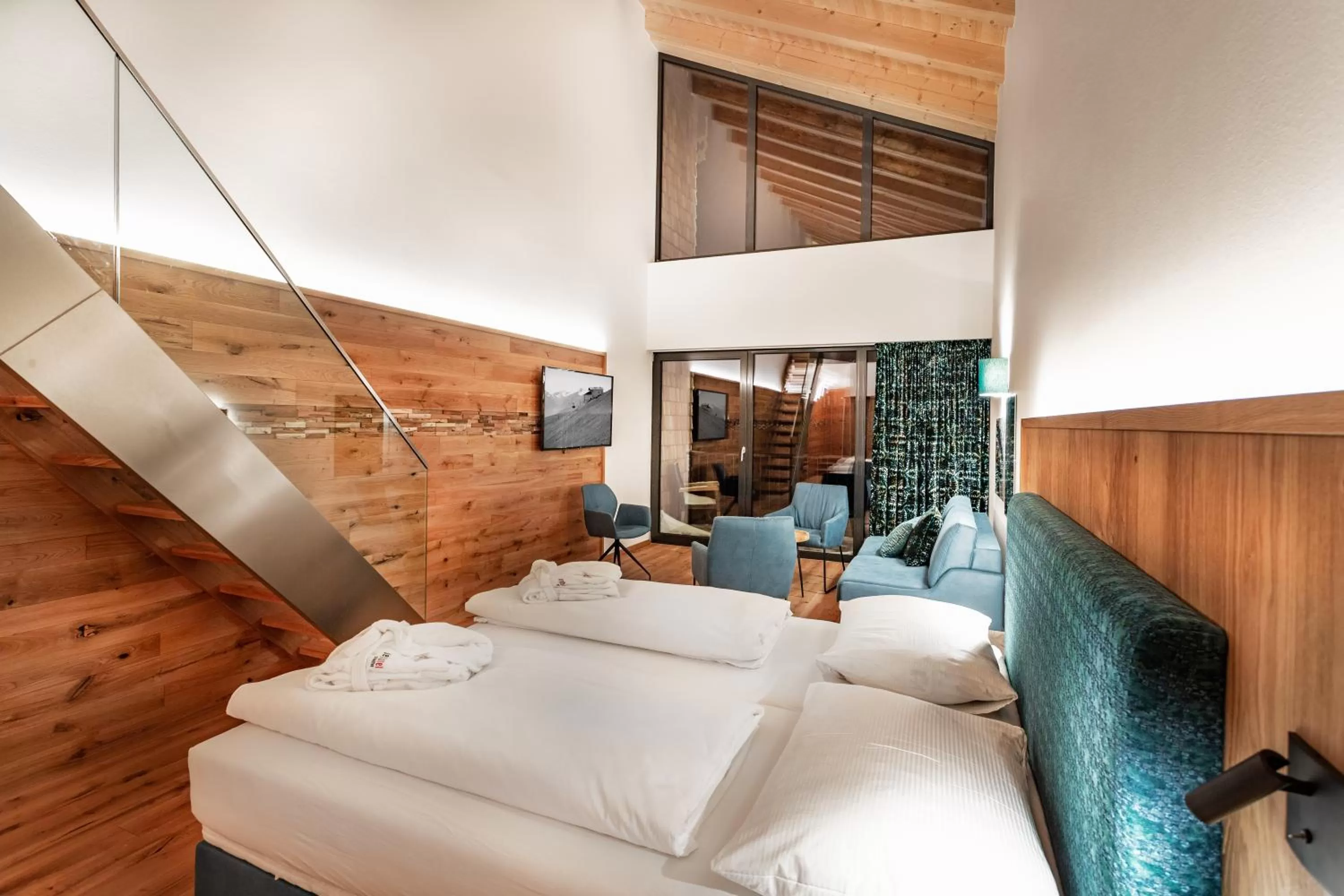 Photo of the whole room, Bed in Berghotel Schmittenhöhe