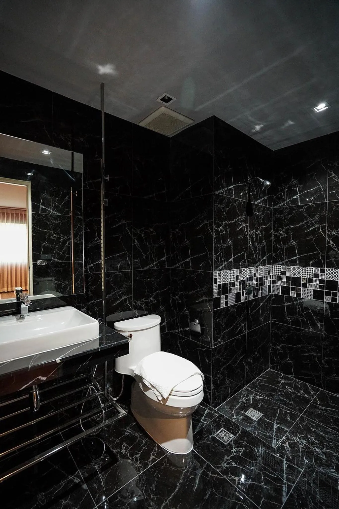 Toilet in Hap@sathorn