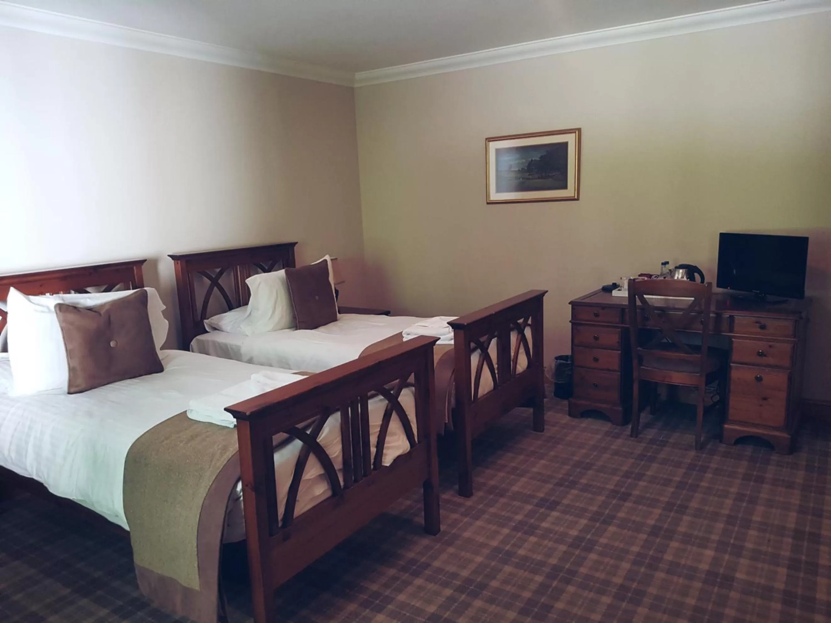 Bed in Meldrum House Hotel Golf And Country Estate