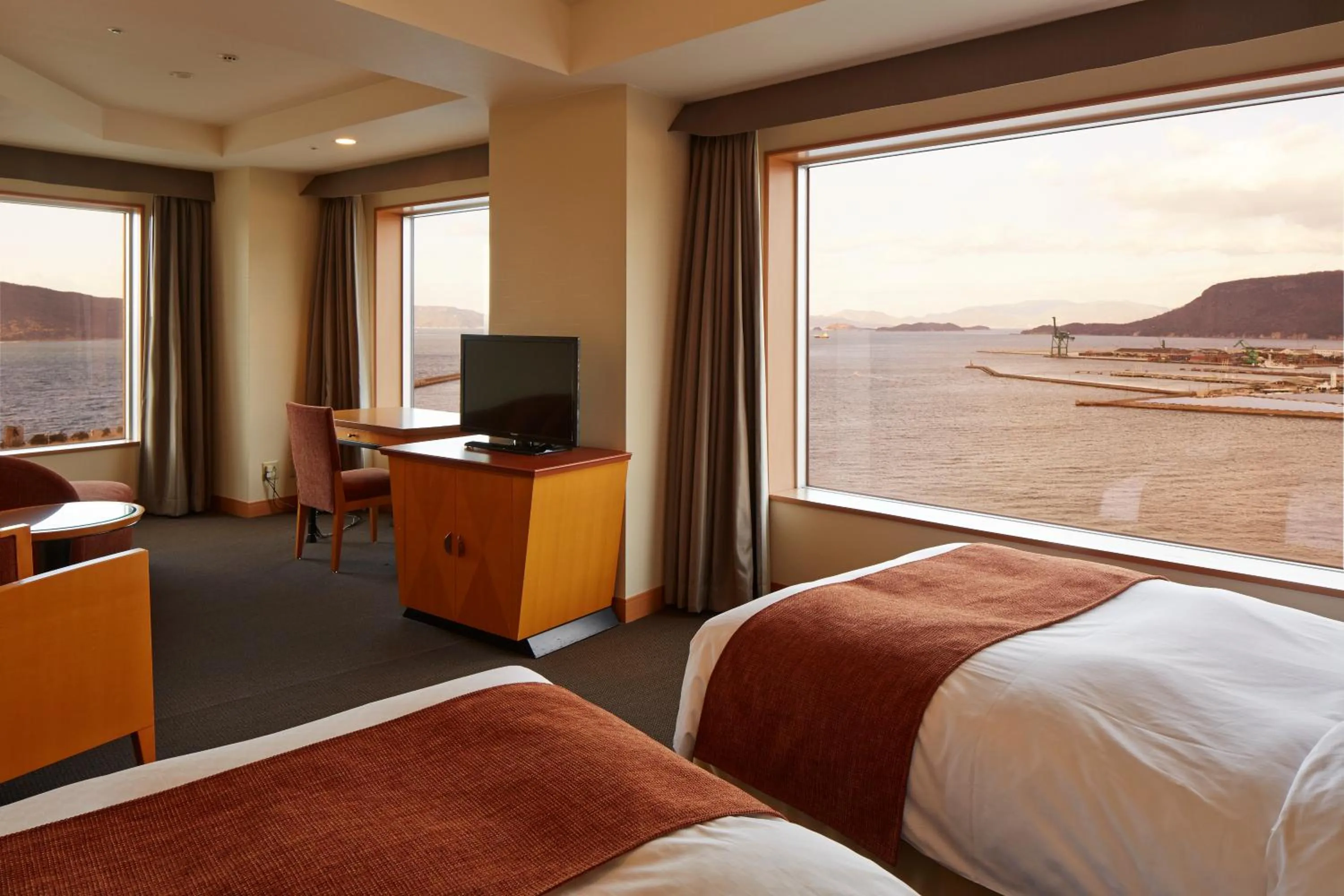 Photo of the whole room, Bed in JR Hotel Clement Takamatsu