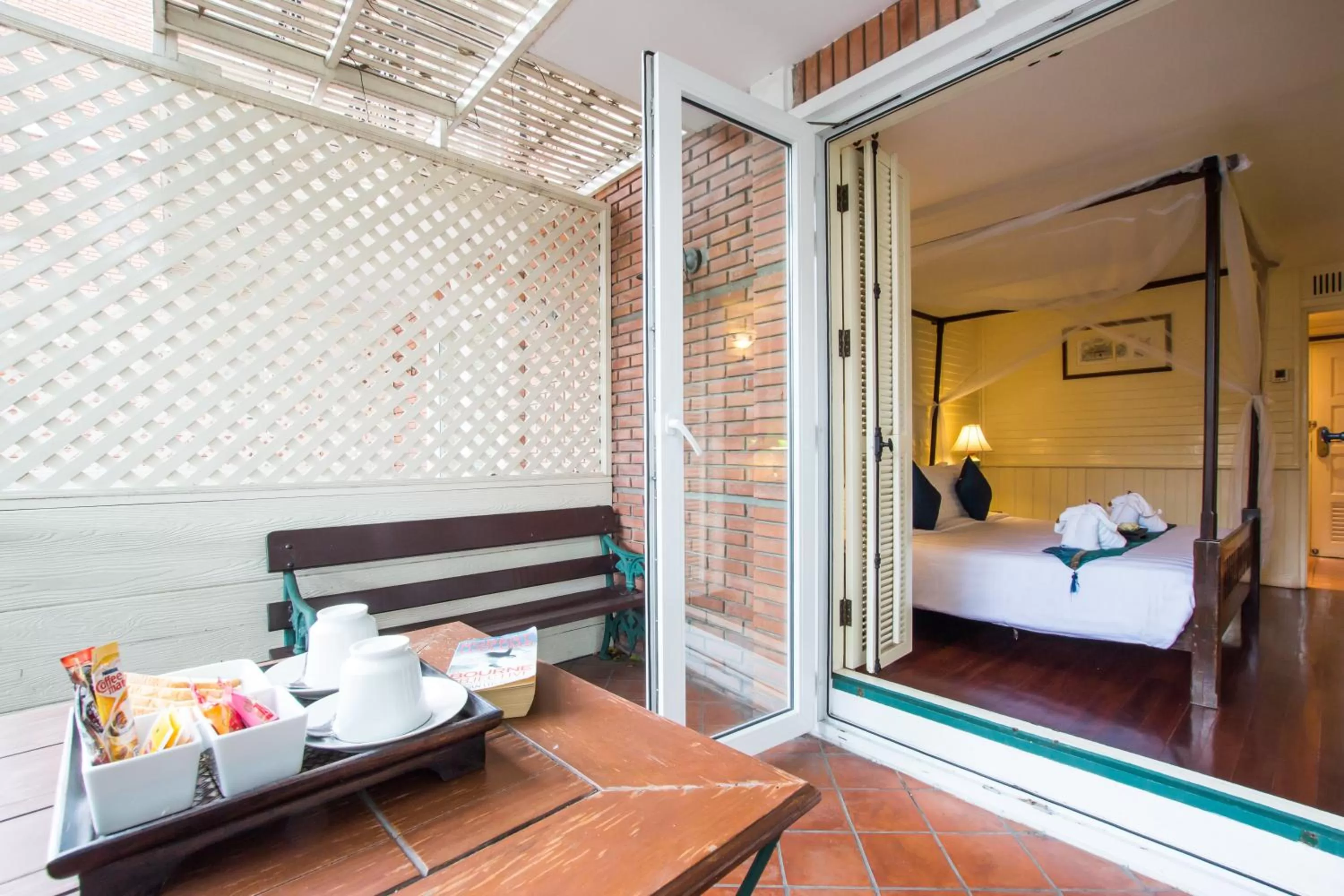 Seating area, Bed in Buddy Lodge, Khaosan Road