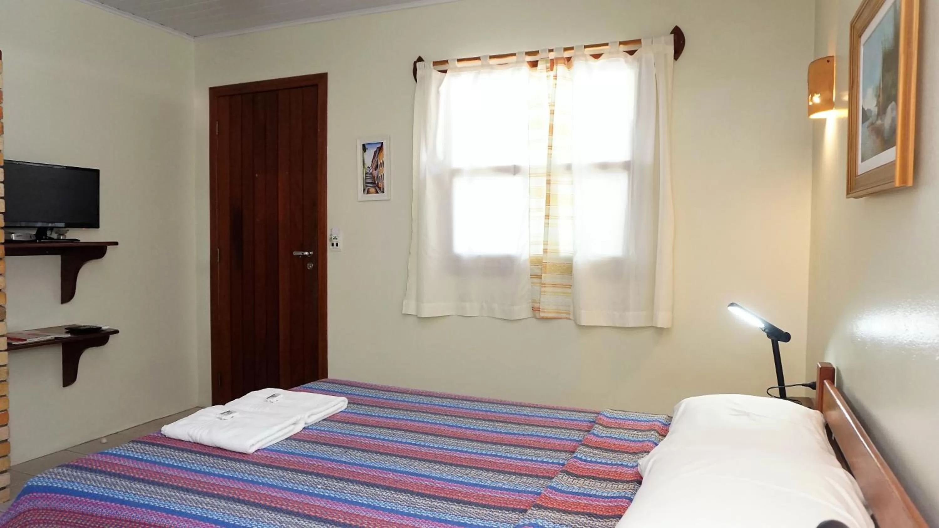 Bed in Pousada Barratur