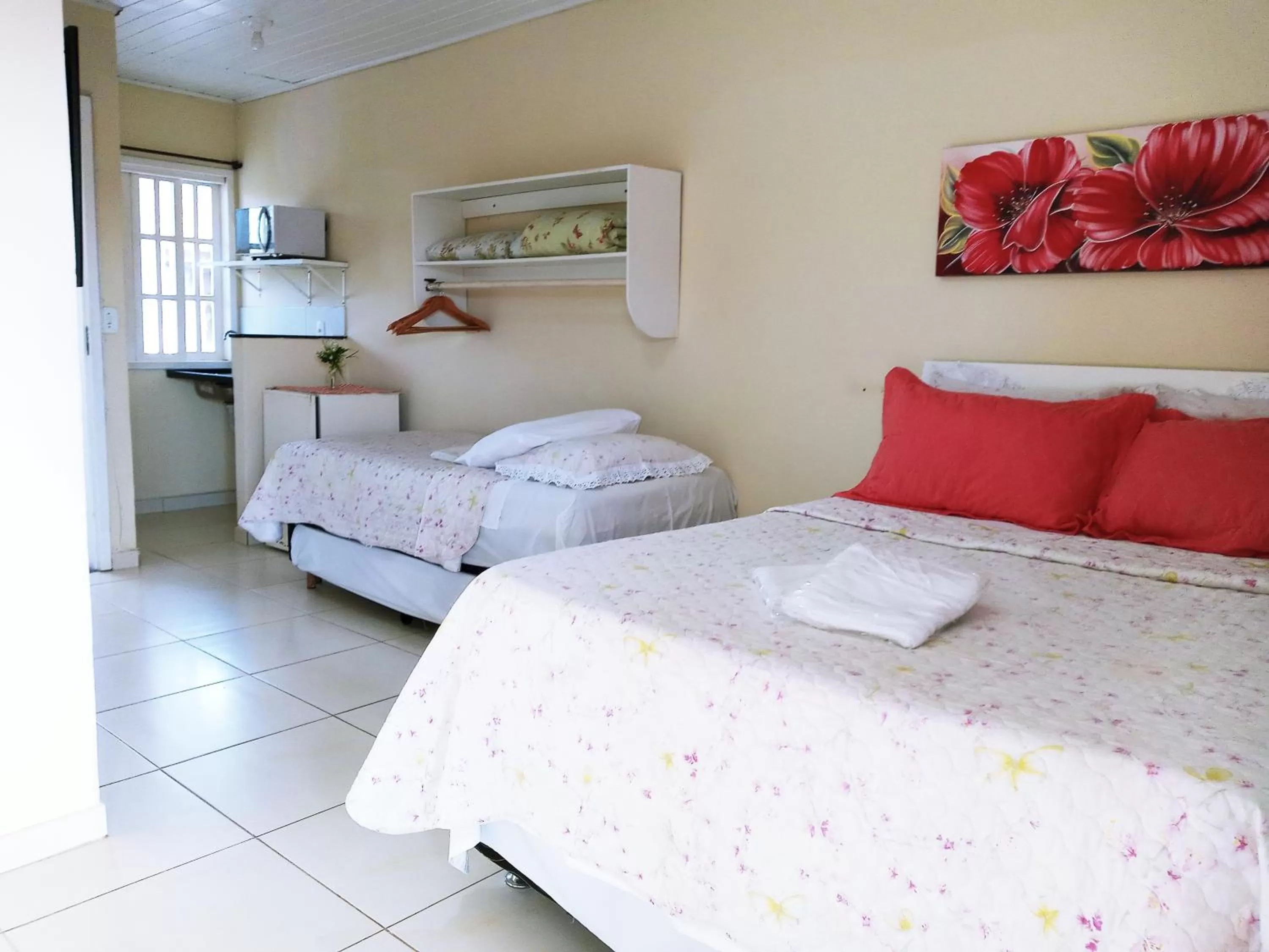 Bed in Pousada Luzes de Geribá