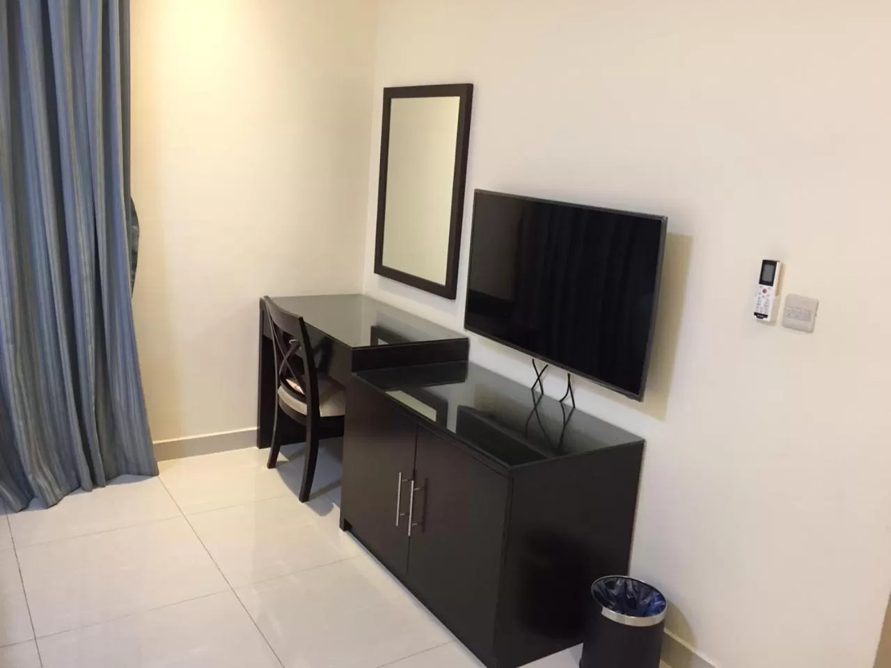 TV/Entertainment Center in Arjaan Altakhassusi Hotel Suites