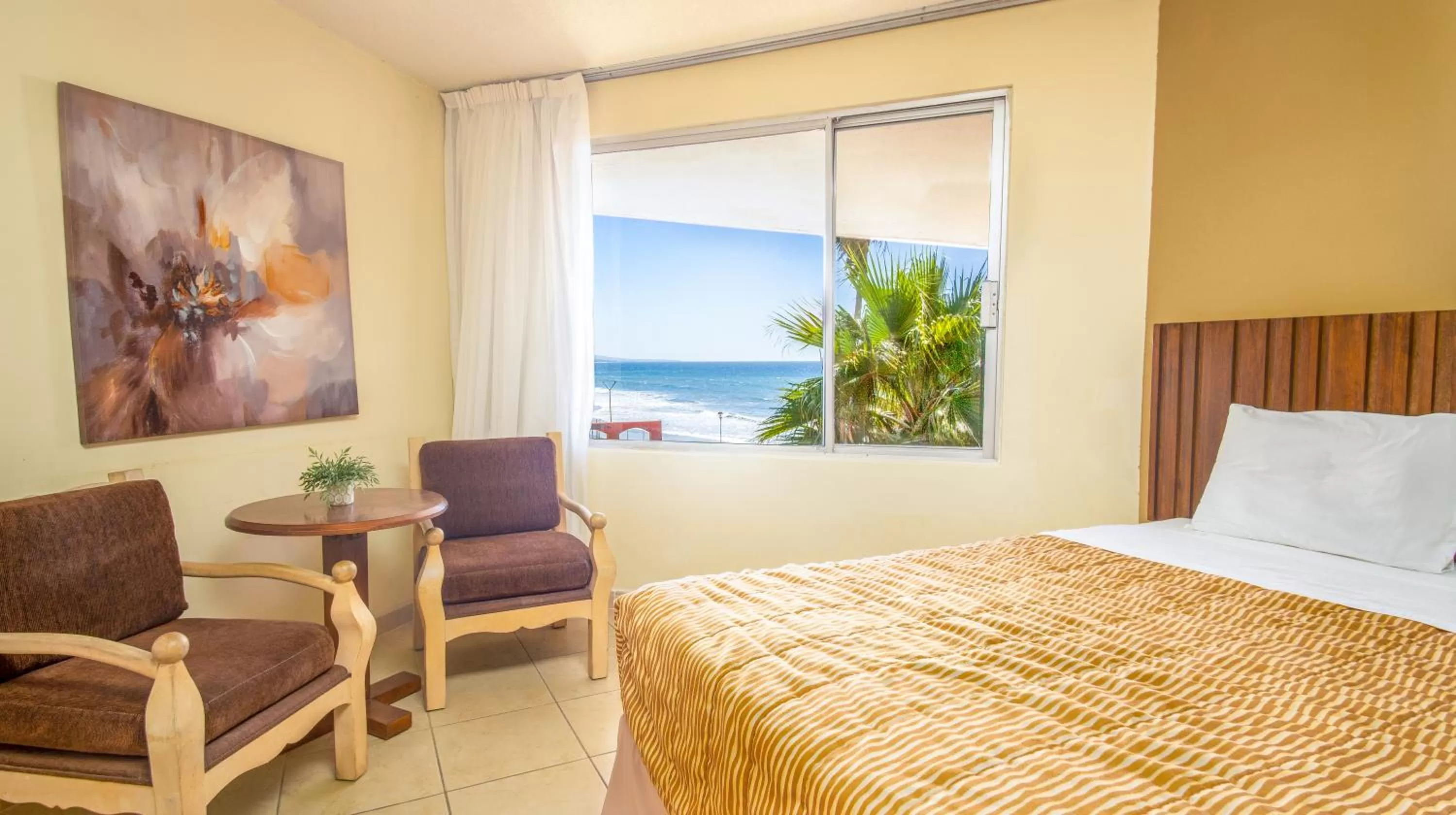 Bed in Puerto Nuevo Baja Hotel & Villas