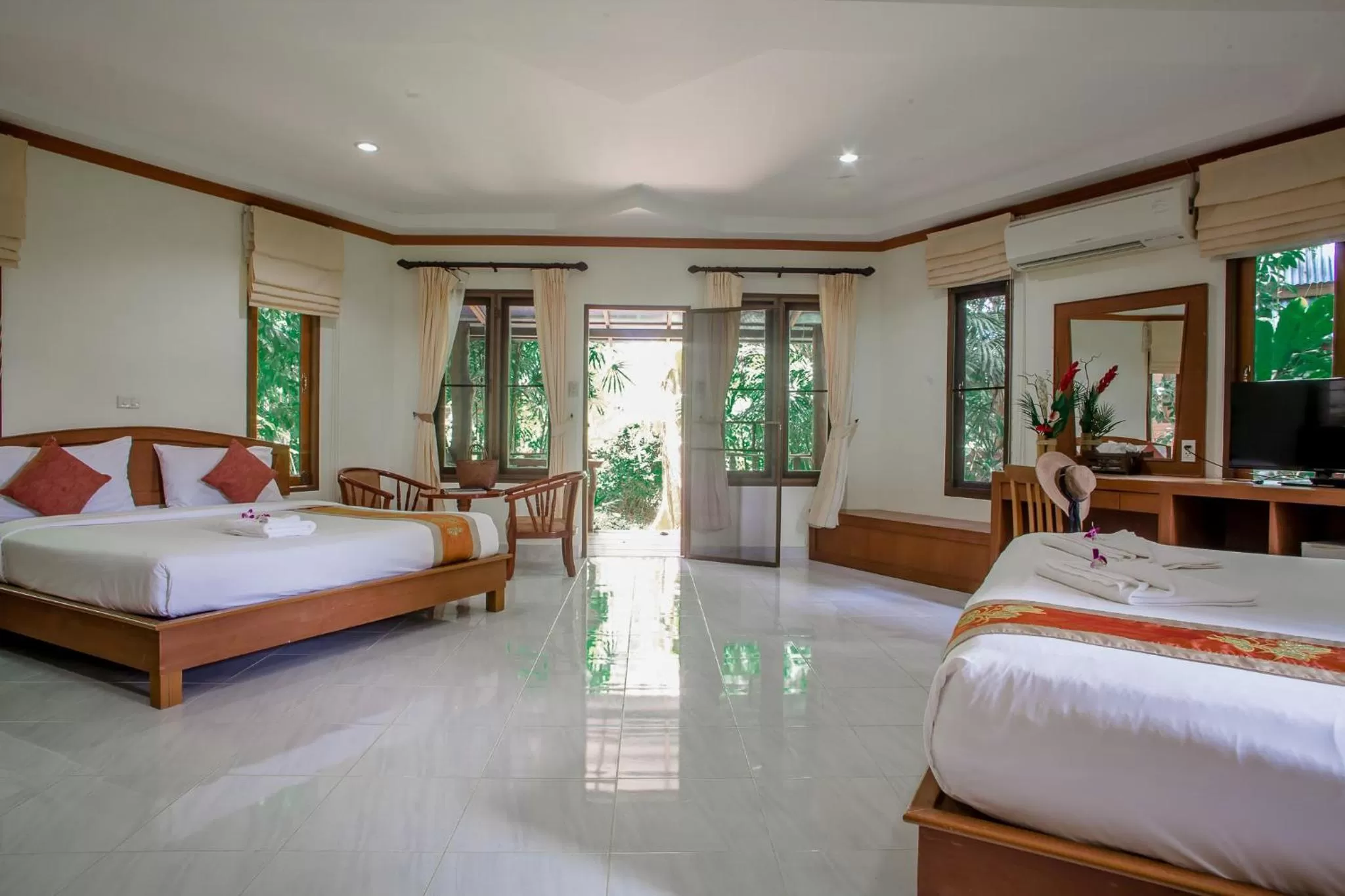 Bed in The Vatika Resort and Spa