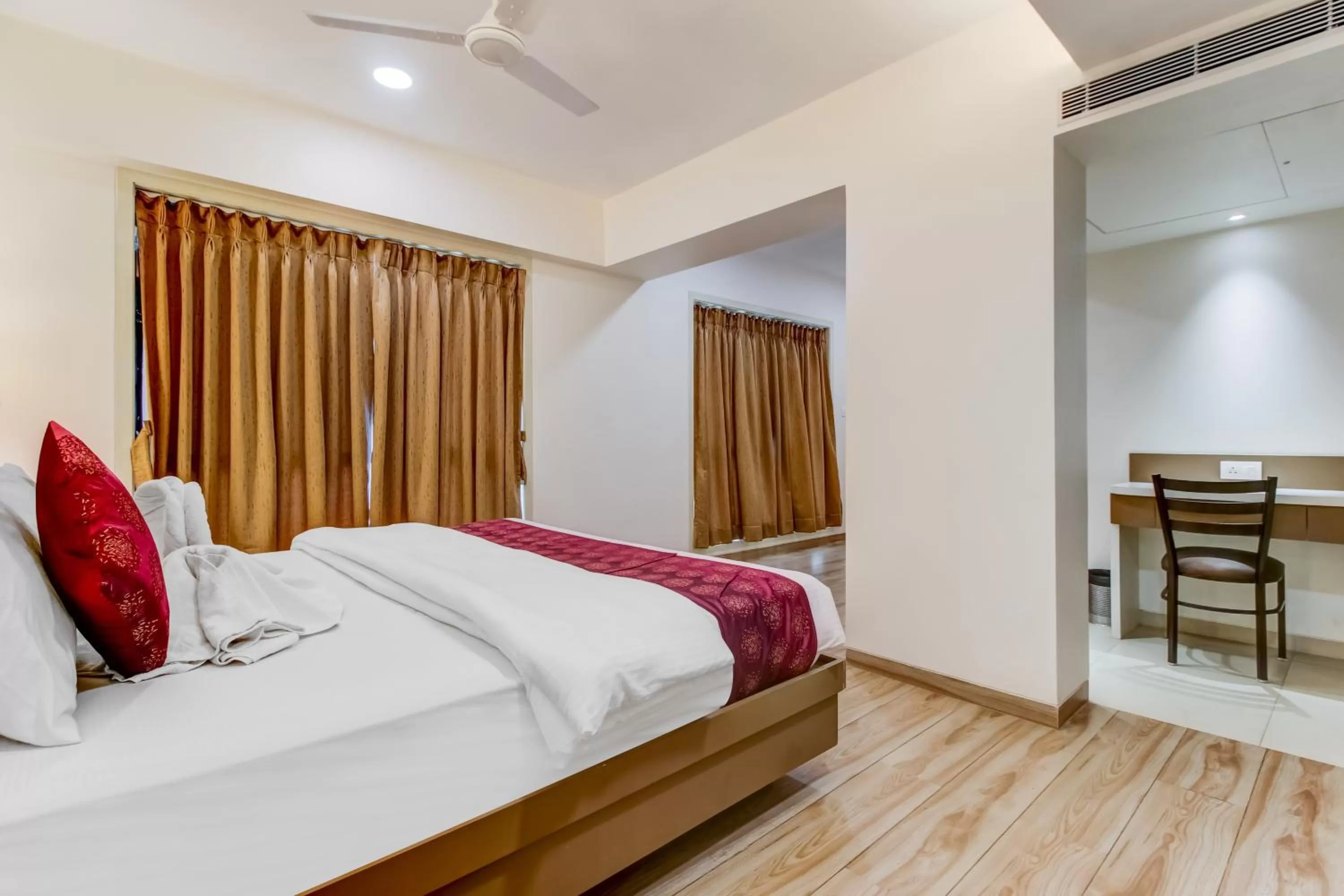 Photo of the whole room, Bed in Grand Mookambika