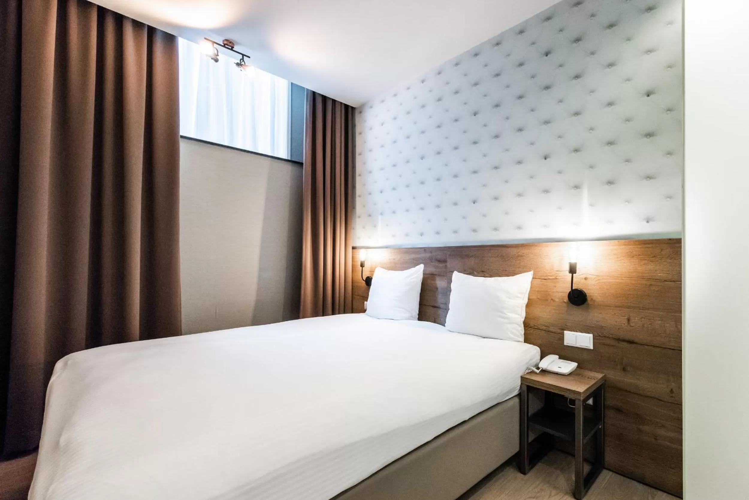 Bed in Melrose Hotel