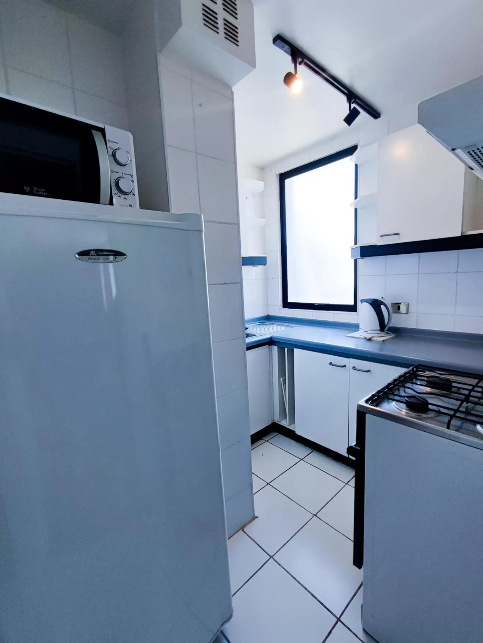 Kitchen or kitchenette in Tempo Rent Apart Hotel