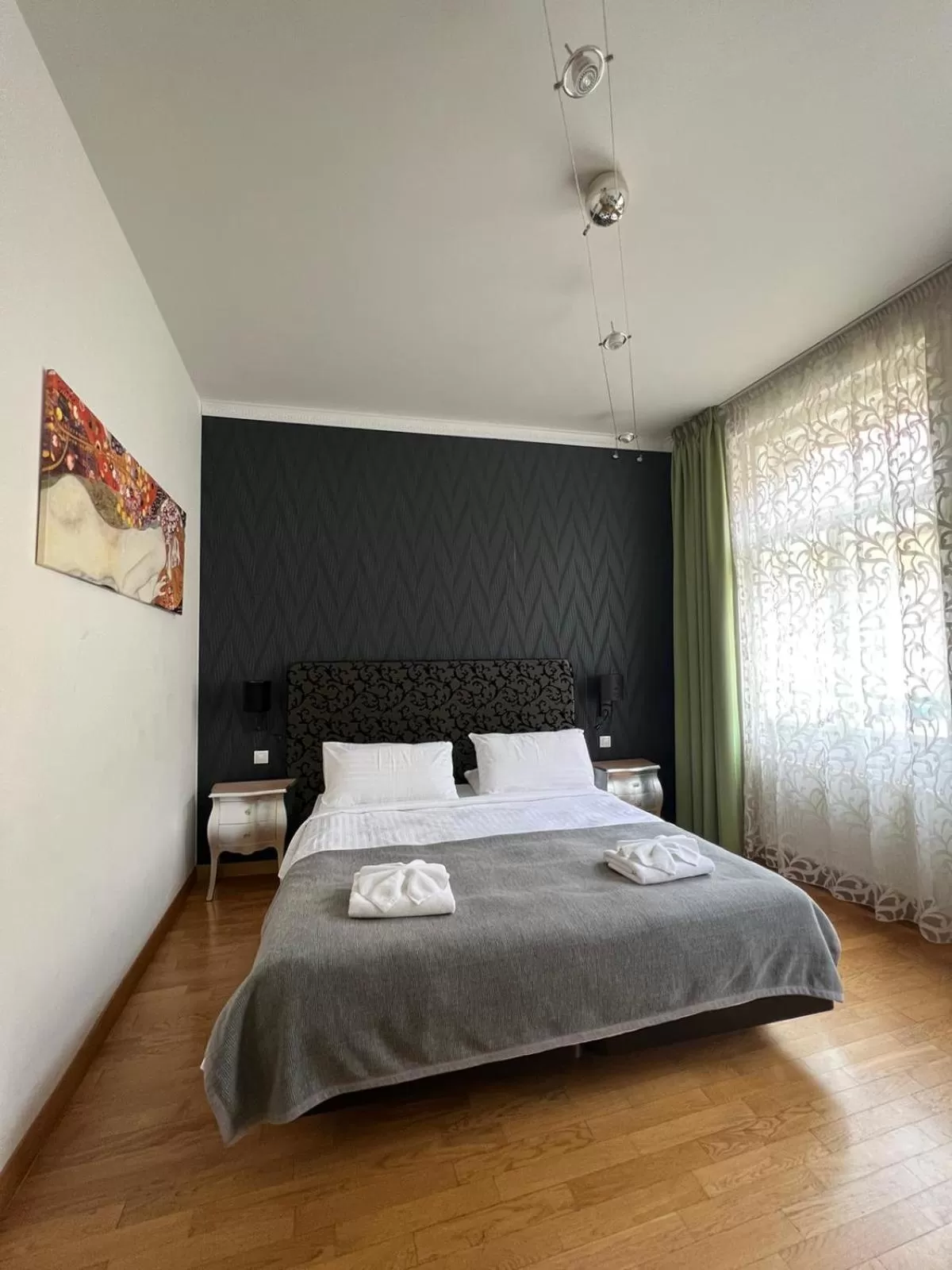 Bed in Dolce Vita Suites Boutique