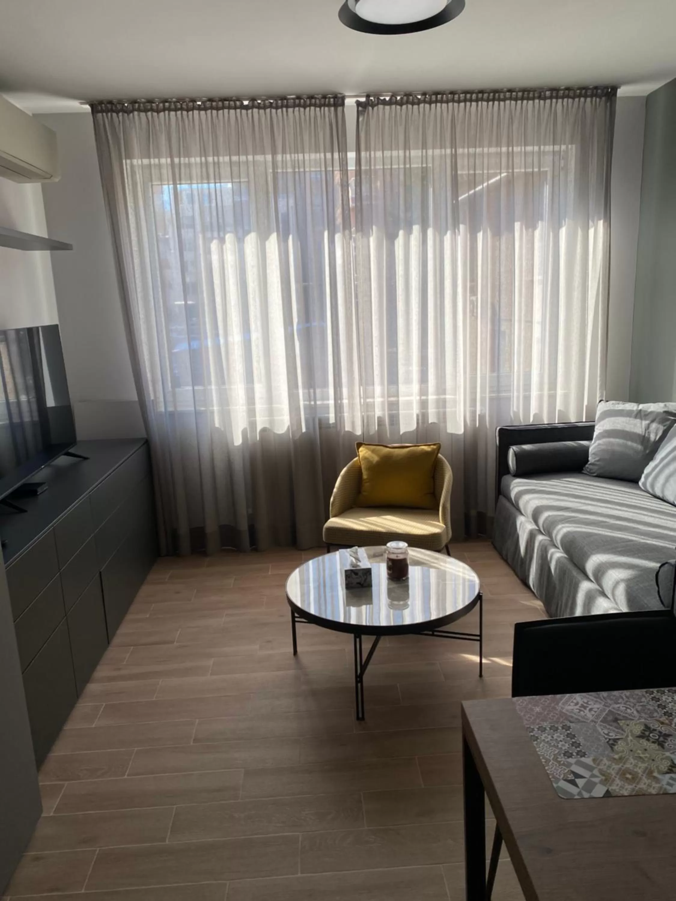 Bed, Seating Area in 7th Sense boutique apartments