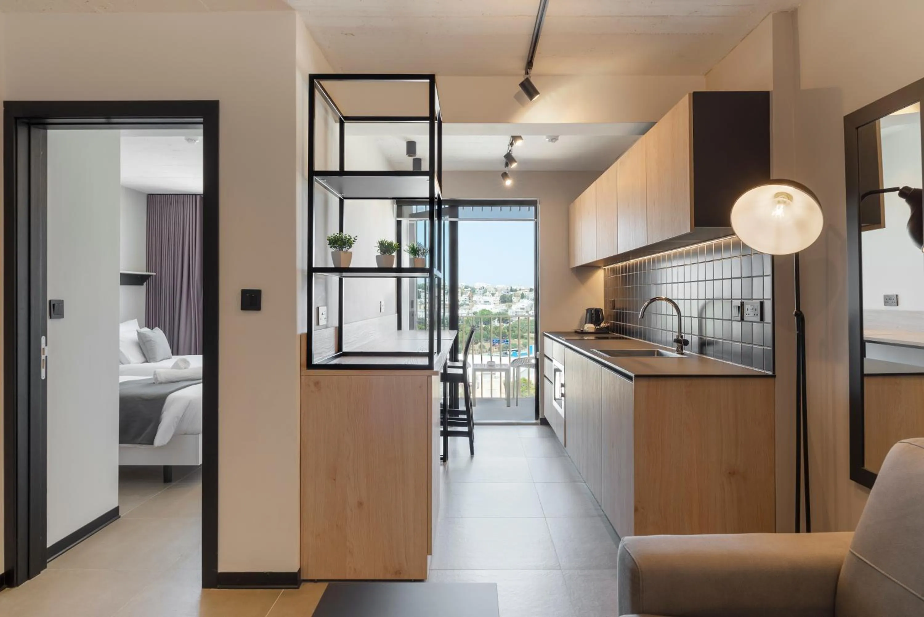 Kitchen or kitchenette, Bed in Aparthotel Adagio Malta Central