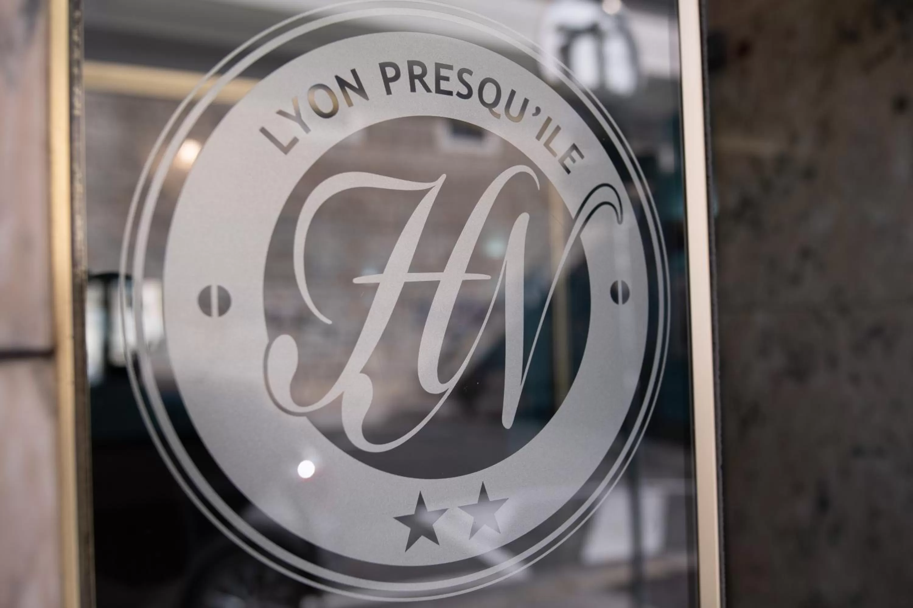 Property logo or sign in Hotel de Normandie