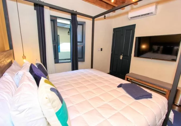 Bed in Antigua Trece Hotel Fusión & SPA