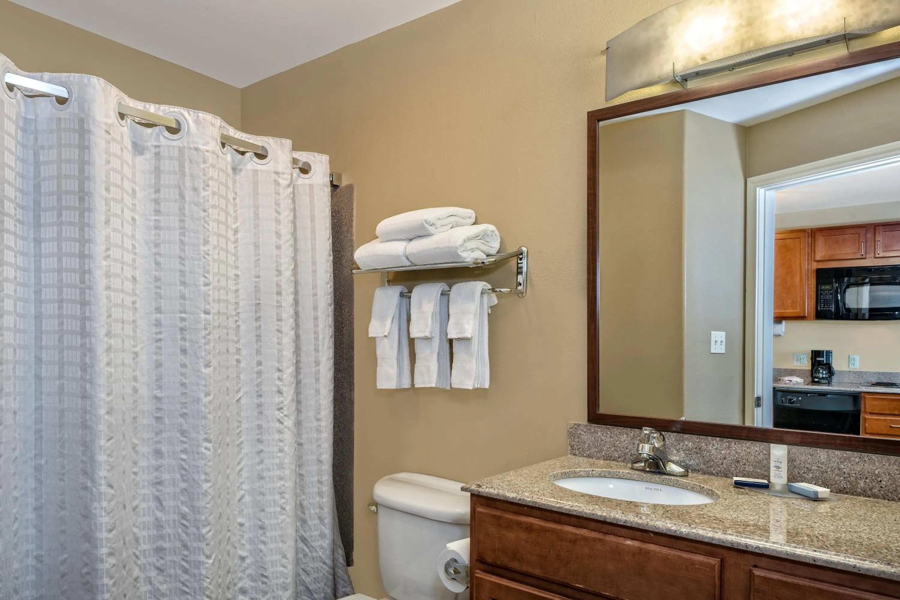 Bedroom in Candlewood Suites Galveston by IHG